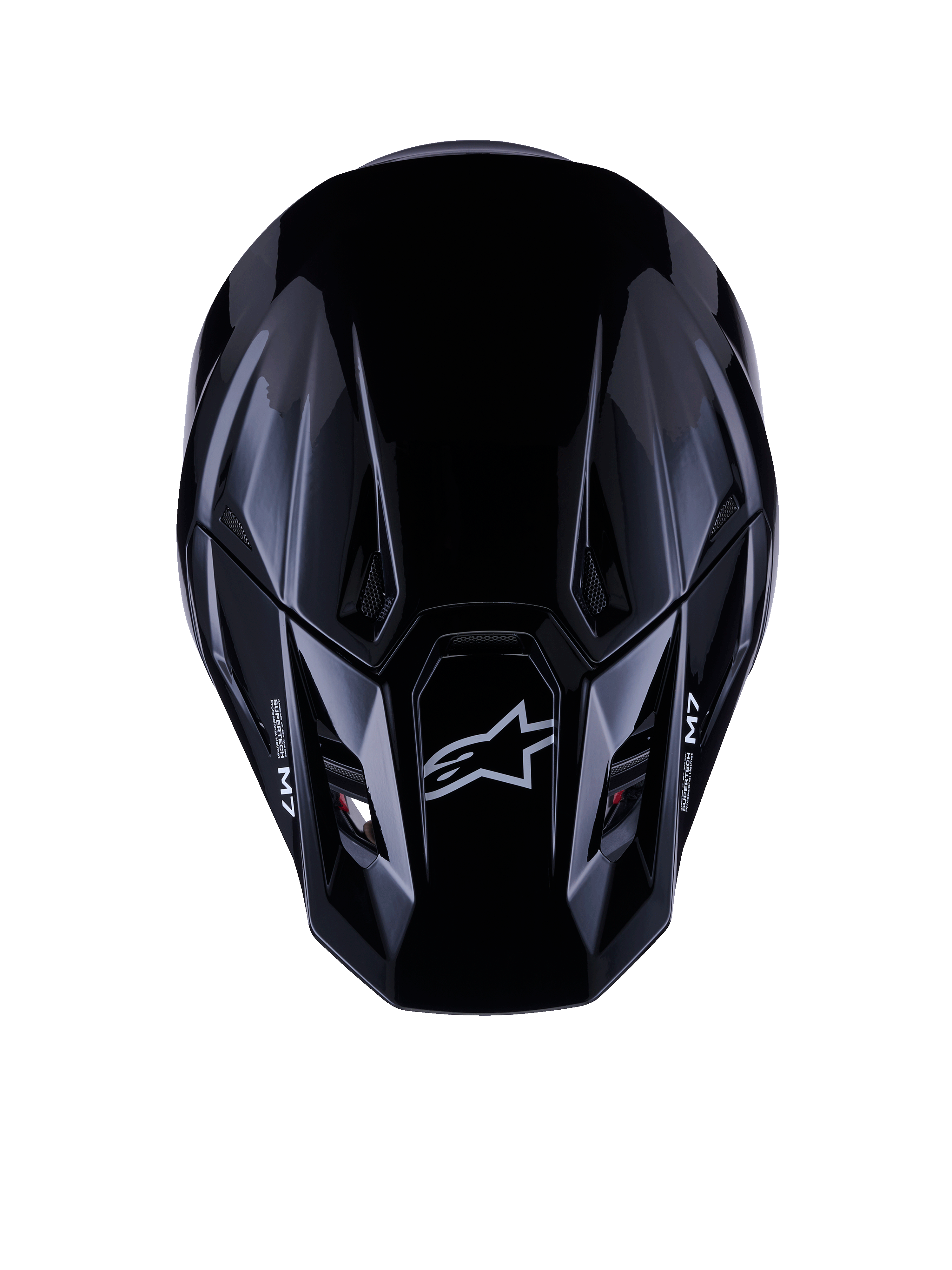 Alpinestars S-M7 Solid Helmet ECE 22.06, casco de motocross, negro brillante, vista superior que muestra la carcasa compuesta aerodinámica con el logo de Astars y la marca M7, diseño estilizado con puertos de ventilación para rendimiento en competición off-road