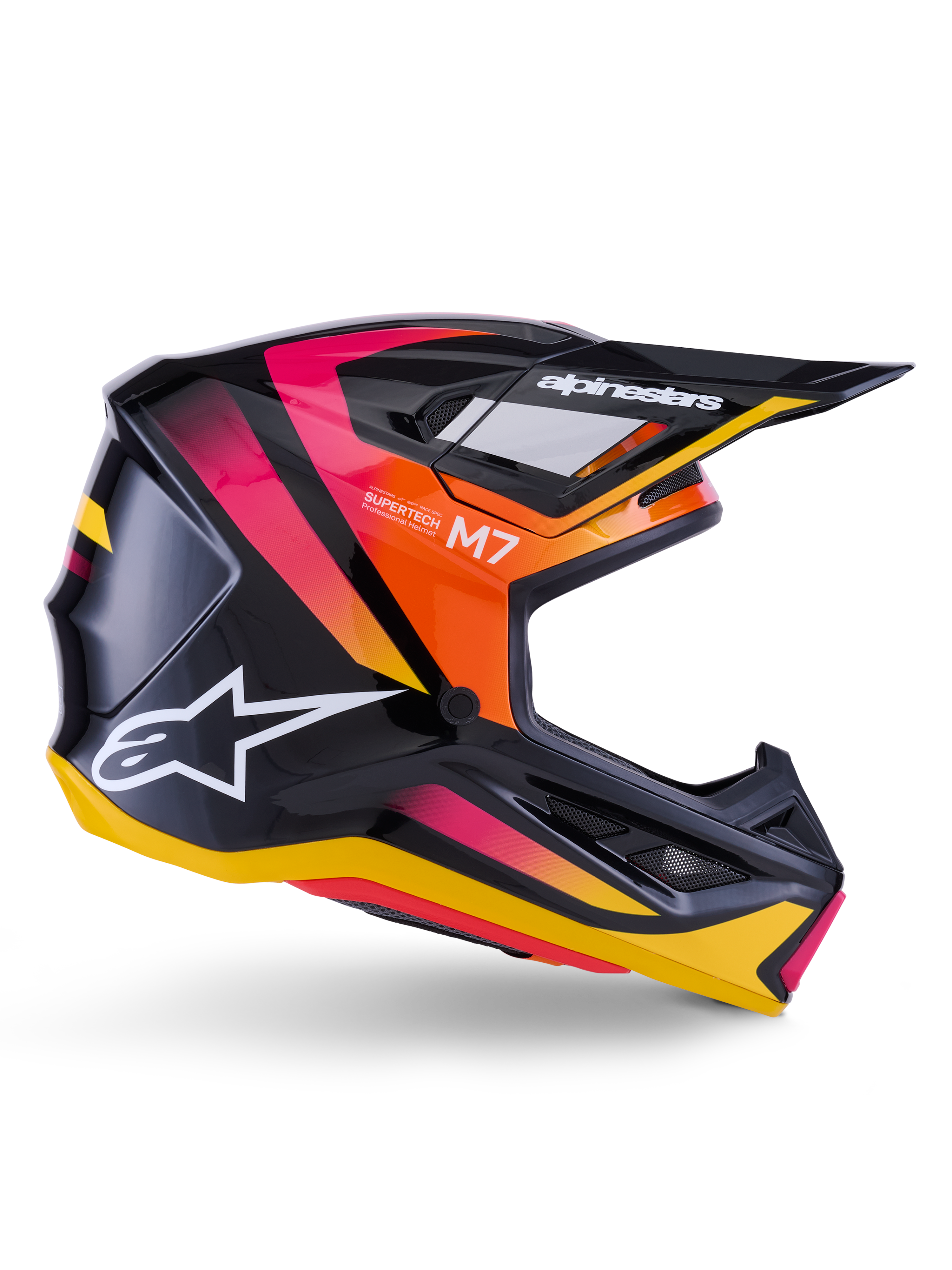 Casco Alpinestars S-M7 Rise, casco de carreras de motocross, negro brillante con gráficos en rosa, naranja y amarillo, vista de perfil lateral, con logotipo blanco de Alpinestars y visera, calota aerodinámica con puertos de ventilación integrados