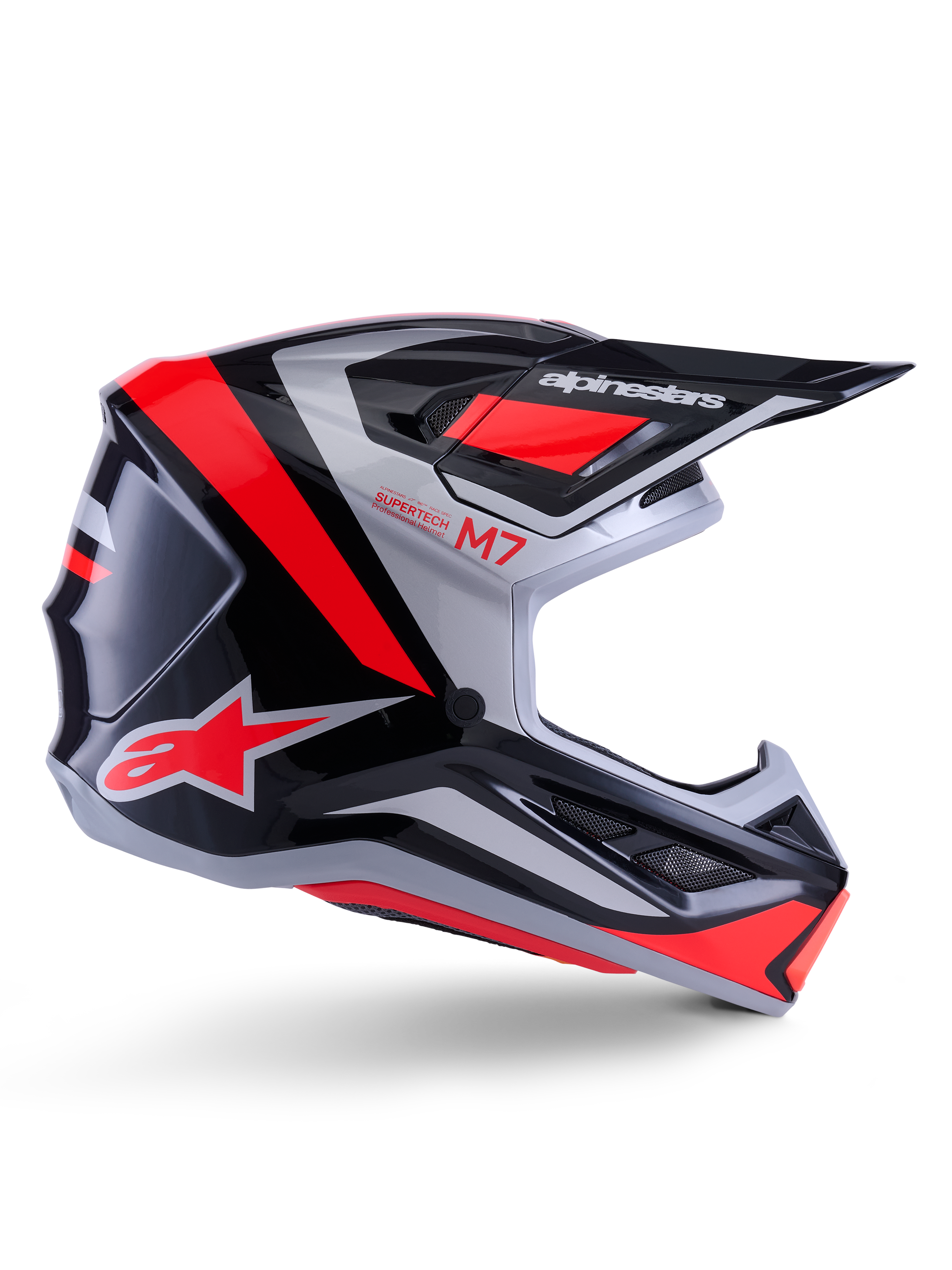 Alpinestars S-M7 Rise Helmet, Motocross Helmet, Black Silver and Red Fluo, side view showing angular aerodynamic design with peak visor and air vents, glossy finish, Supertech M7 series