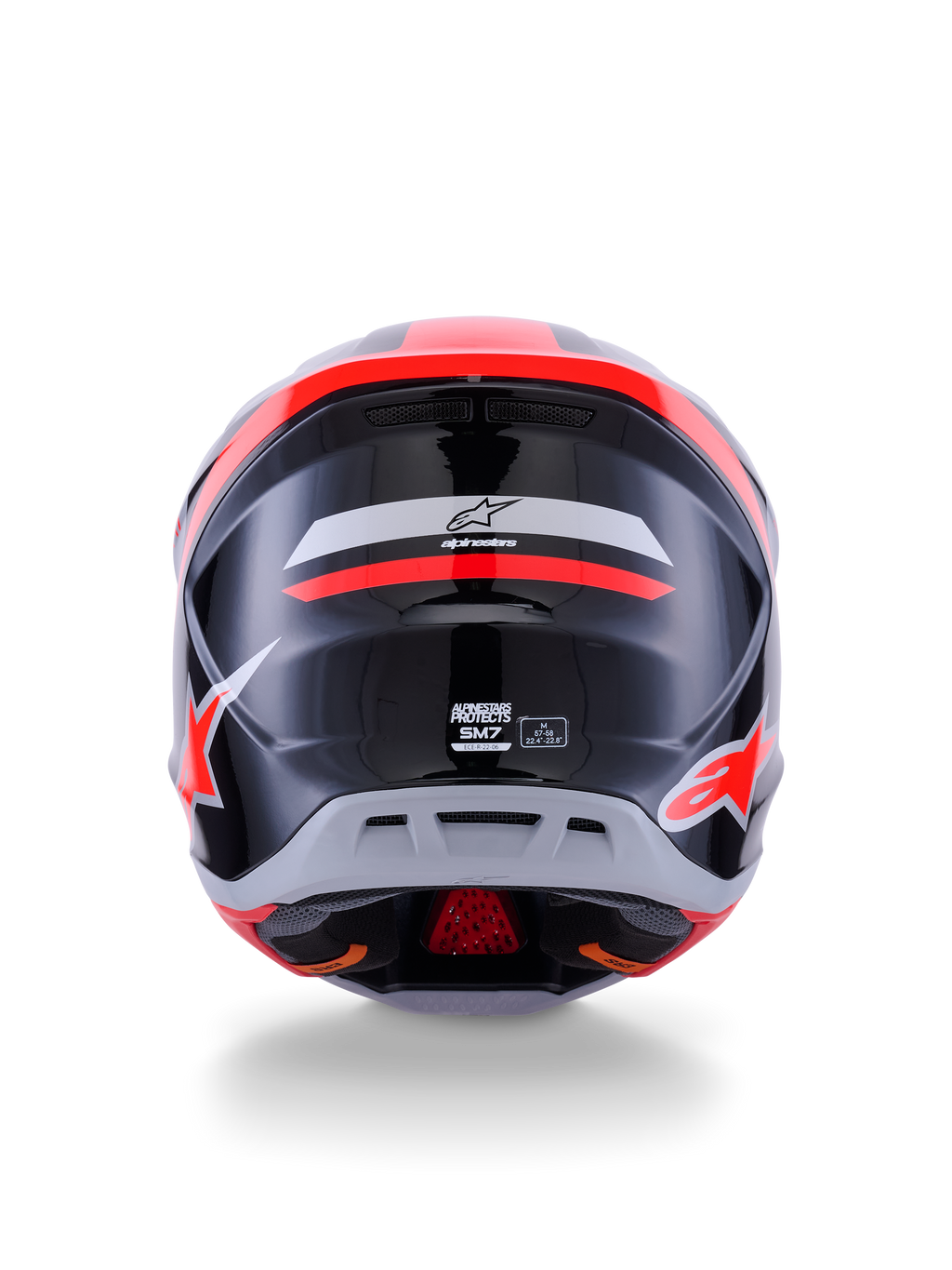 Casco Alpinestars S-M7 Rise ECE 22.06, casco de motocross, vista trasera, negro, plateado y rojo flúor brillante, con el logotipo de Alpinestars y la marca S-M7, acabado brillante con calota aerodinámica y detalles de ventilación