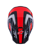 Alpinestars S-M7 Rise Helmet ECE 22.06, casco de motocross, negro, plata y rojo flúor brillante, vista superior que muestra la calota aerodinámica con puertos de ventilación, con rayas rojas fluorescentes y el logotipo de Alpinestars, equipamiento profesional para carreras todoterreno