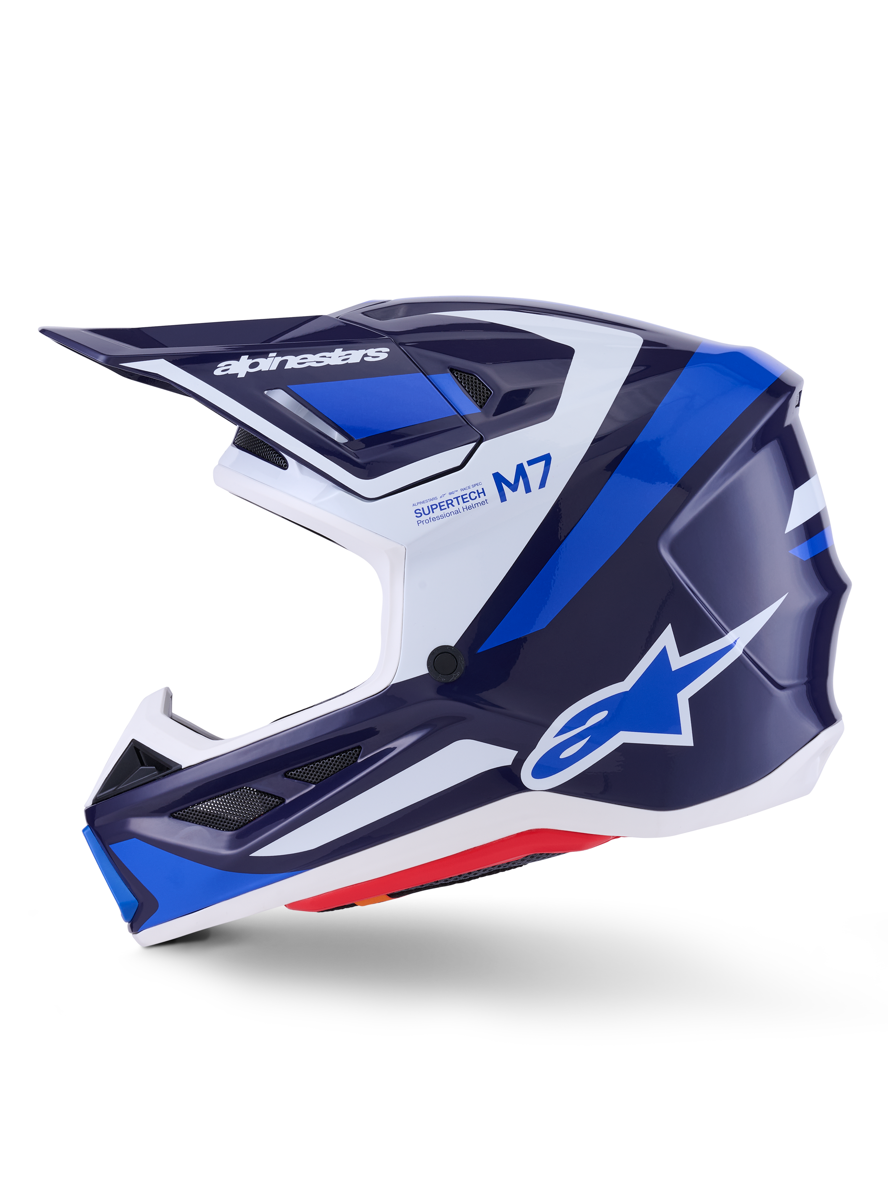 Casco Alpinestars S-M7 Rise, casco de motocross, azul, blanco y azul marino brillante, vista de perfil lateral con la marca Alpinestars en la visera y el lateral, texto M7 y Supertech, calota aerodinámica con puertos de ventilación, acabado brillante para rendimiento off-road.