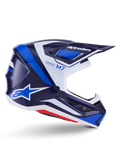 Casco Alpinestars S-M7 Rise, casco de carreras de motocross, azul y blanco con acabado brillante, perfil lateral con carcasa de compuesto aerodinámico, visera ventilada y diseño angular con marca distintiva, protección profesional para off-road