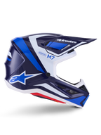 Casco Alpinestars S-M7 Rise, casco de carreras de motocross, azul y blanco con acabado brillante, perfil lateral con carcasa de compuesto aerodinámico, visera ventilada y diseño angular con marca distintiva, protección profesional para off-road