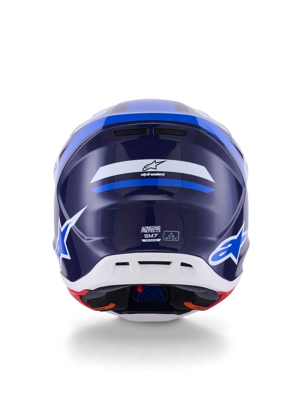 Casco Alpinestars S-M7 Rise, vista trasera, azul y blanco brillante, con el logotipo de Alpinestars y la marca SM7, carcasa de compuesto aerodinámico con sección inferior blanca y puertos de ventilación, protección para la cabeza de motocross de alto rendimiento