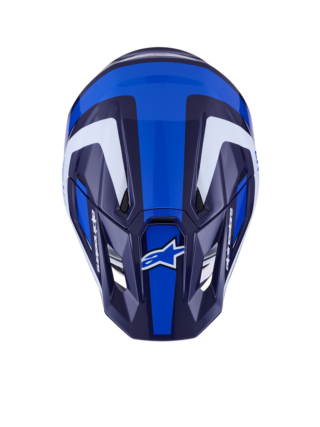 Casco Alpinestars S-M7 Rise, casco de motocross, azul y blanco brillante, vista superior que muestra la calota aerodinámica y los puertos de ventilación, con gráficos angulares en blanco y azul oscuro y logotipos llamativos.