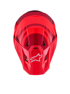 Casco Alpinestars S-M7 Core, Rojo Brillante, vista superior con calota aerodinámica y detalles en rojo oscuro, logotipo A-star blanco en la visera, puertos de ventilación integrados, equipo de protección de motocross de alto rendimiento