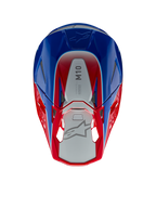 Casco Alpinestars Supertech M10 Aeon, casco de motocross, rojo y azul brillante, vista superior que muestra el panel central plateado con la marca M10, calota aerodinámica con detalles en rojo y azul, puertos de ventilación de malla, protección para la cabeza de motocross de alto rendimiento