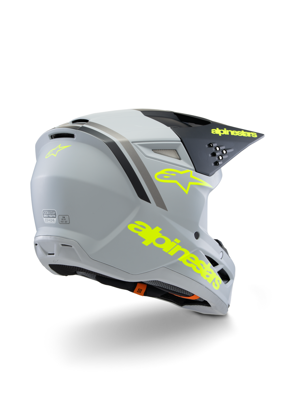 Casco Alpinestars S-M3 Juvenil Radium ECE 22.06, casco de motocross, gris, negro y amarillo flúor mate, vista trasera de tres cuartos que muestra el logotipo de la estrella y la marca en amarillo llamativo, calota aerodinámica con ventilación para conducción off-road