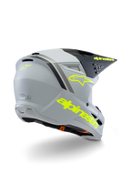 Casco Alpinestars S-M3 Juvenil Radium ECE 22.06, casco de motocross, gris, negro y amarillo flúor mate, vista trasera de tres cuartos que muestra el logotipo de la estrella y la marca en amarillo llamativo, calota aerodinámica con ventilación para conducción off-road