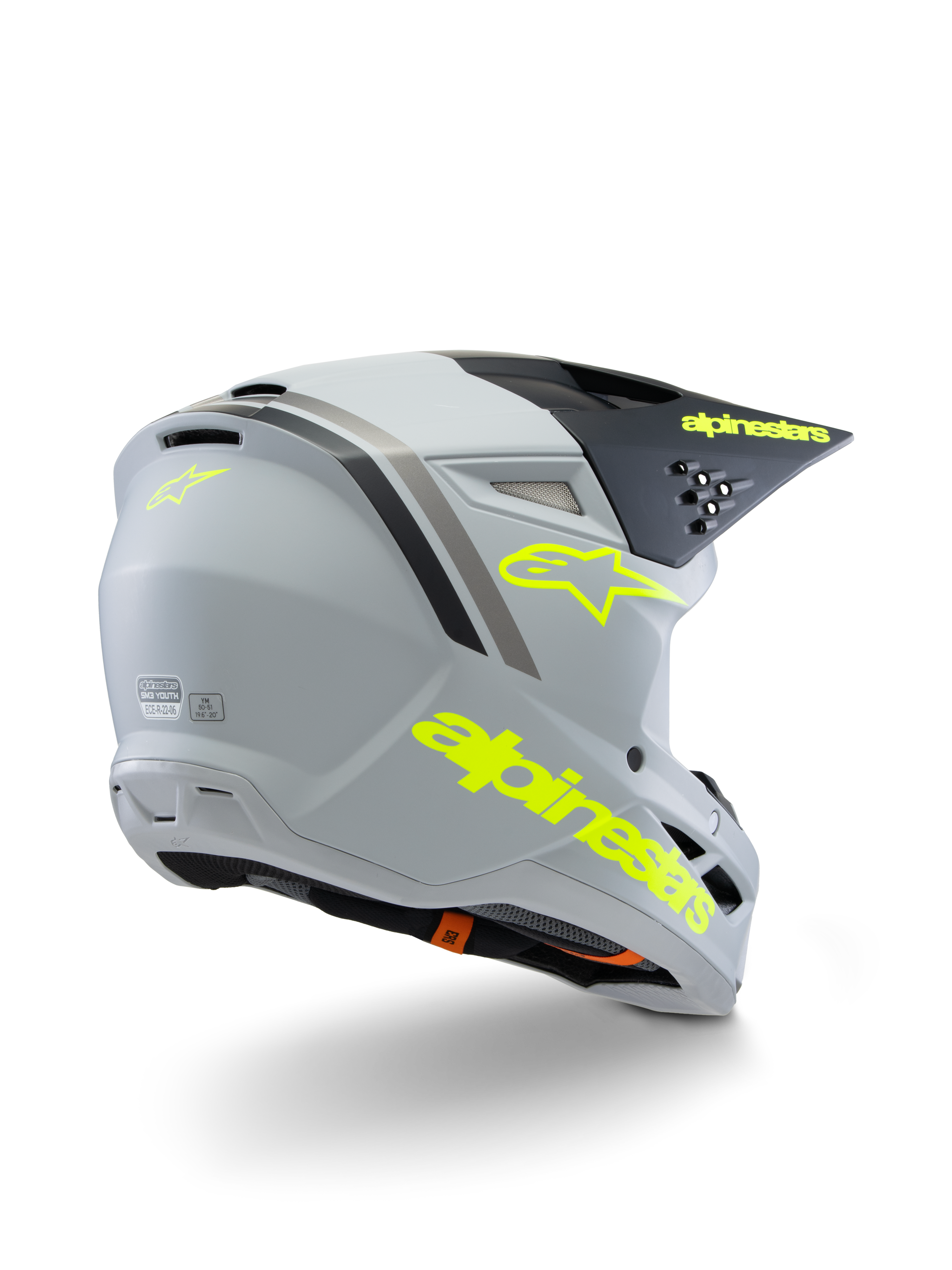 Casco Alpinestars S-M3 Juvenil Radium ECE 22.06, casco de motocross, gris, negro y amarillo flúor mate, vista trasera de tres cuartos que muestra el logotipo de la estrella y la marca en amarillo llamativo, calota aerodinámica con ventilación para conducción off-road