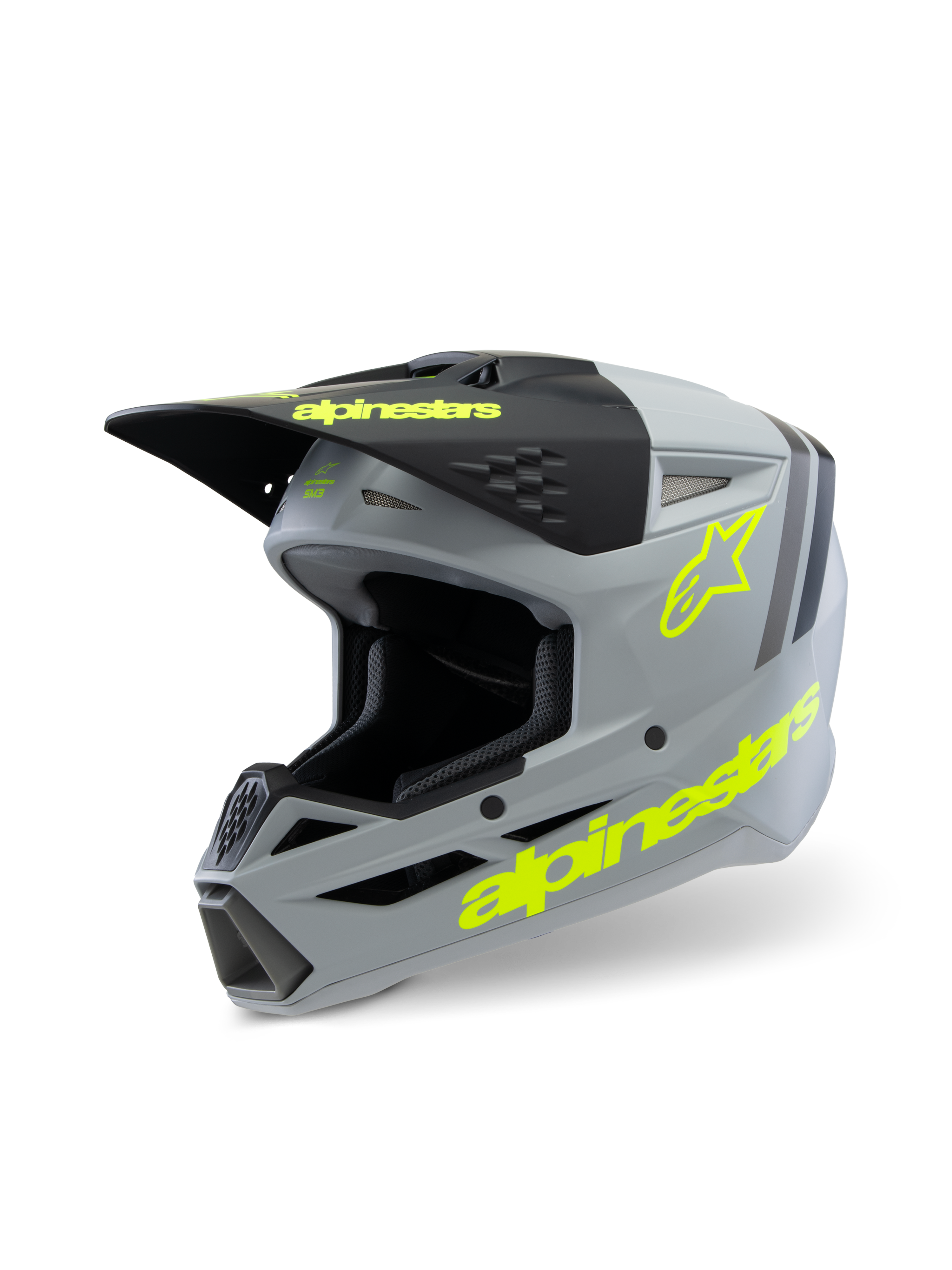 Alpinestars S-M3 Youth Radium Helmet ECE 22.06, casco de motocross, gris mate y negro con detalles en amarillo flúor, con logotipos llamativos de Alpinestars y el logo de la estrella, equipo de protección off-road juvenil