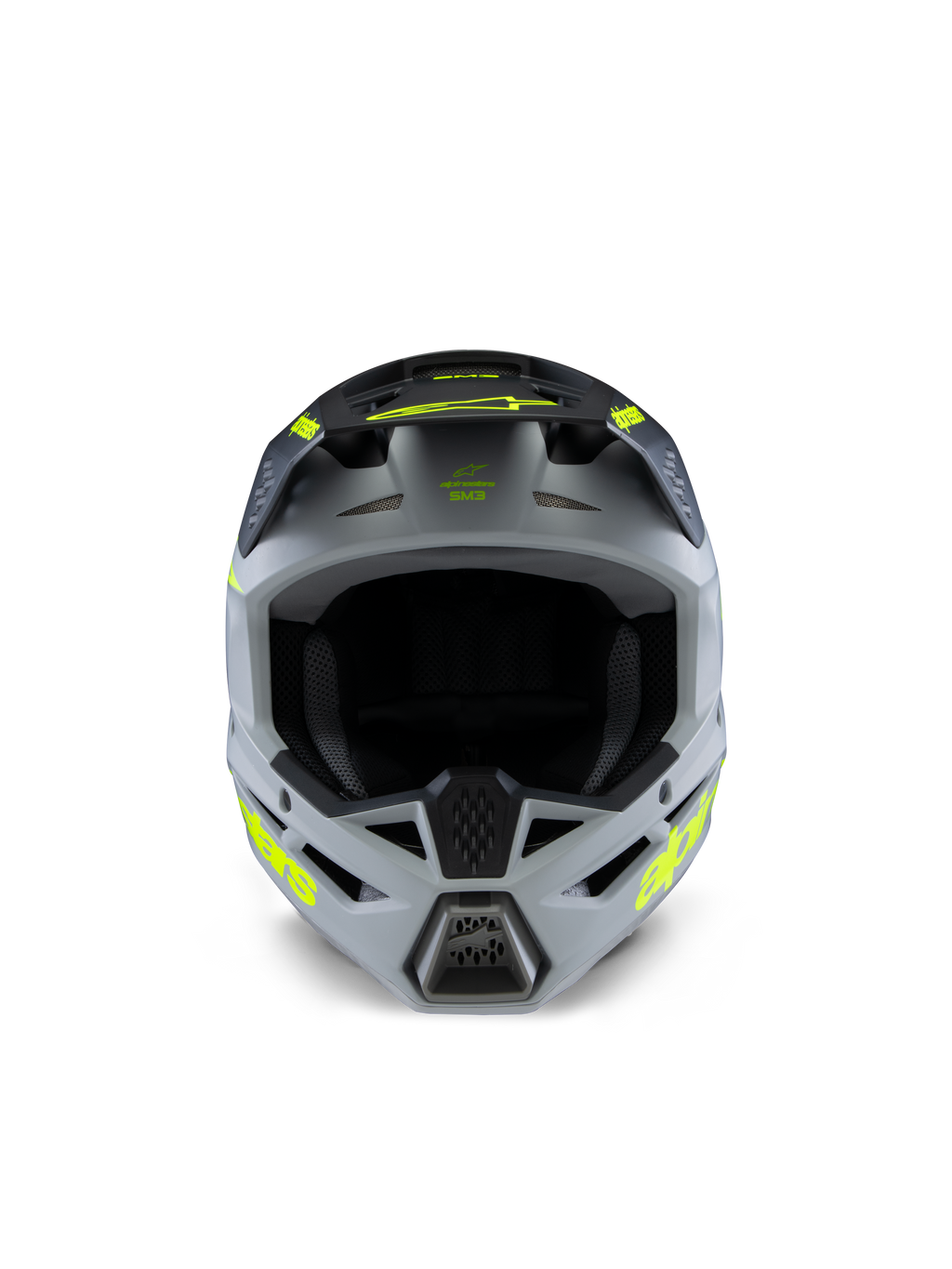 Casco Alpinestars S-M3 Juvenil Radium, casco de motocross, gris, negro y amarillo flúor mate, vista frontal con una calota angular agresiva, logotipos amarillos vibrantes en los laterales y la visera, acabado mate diseñado para carreras juveniles de motocross y off-road