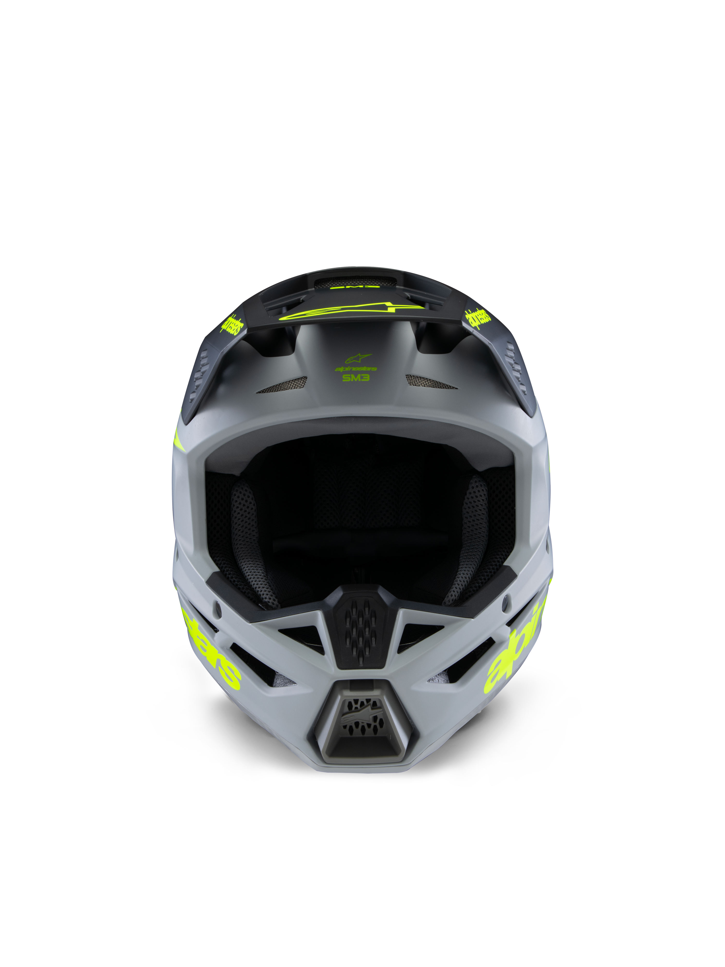 Casco Alpinestars S-M3 Juvenil Radium, casco de motocross, gris, negro y amarillo flúor mate, vista frontal con una calota angular agresiva, logotipos amarillos vibrantes en los laterales y la visera, acabado mate diseñado para carreras juveniles de motocross y off-road