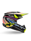 Casco Alpinestars S-M3 Youth Wurx, casco de motocross juvenil, negro con franjas gráficas amarillas, azules, rojas y naranjas, perfil lateral con visera aerodinámica y acabado brillante, con logotipo blanco de Alpinestars y gráfico de estrella amarilla