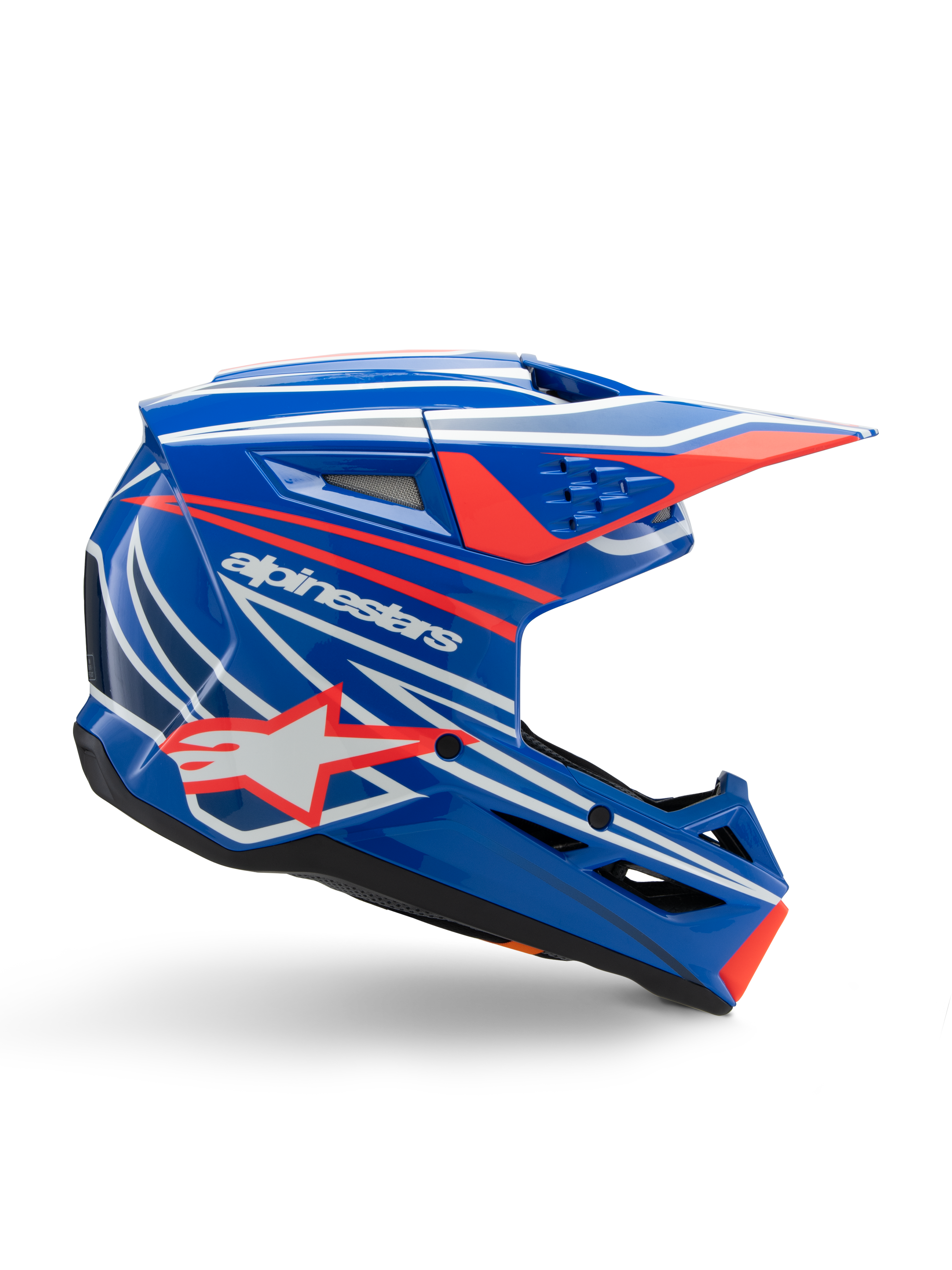 Alpinestars S-M3 Youth Wurx Helmet, casco de motocross juvenil, azul con gráficos en rojo y blanco, perfil lateral con visera aerodinámica, ranuras de ventilación y logotipo de estrella, acabado brillante, con certificación ECE 22.06