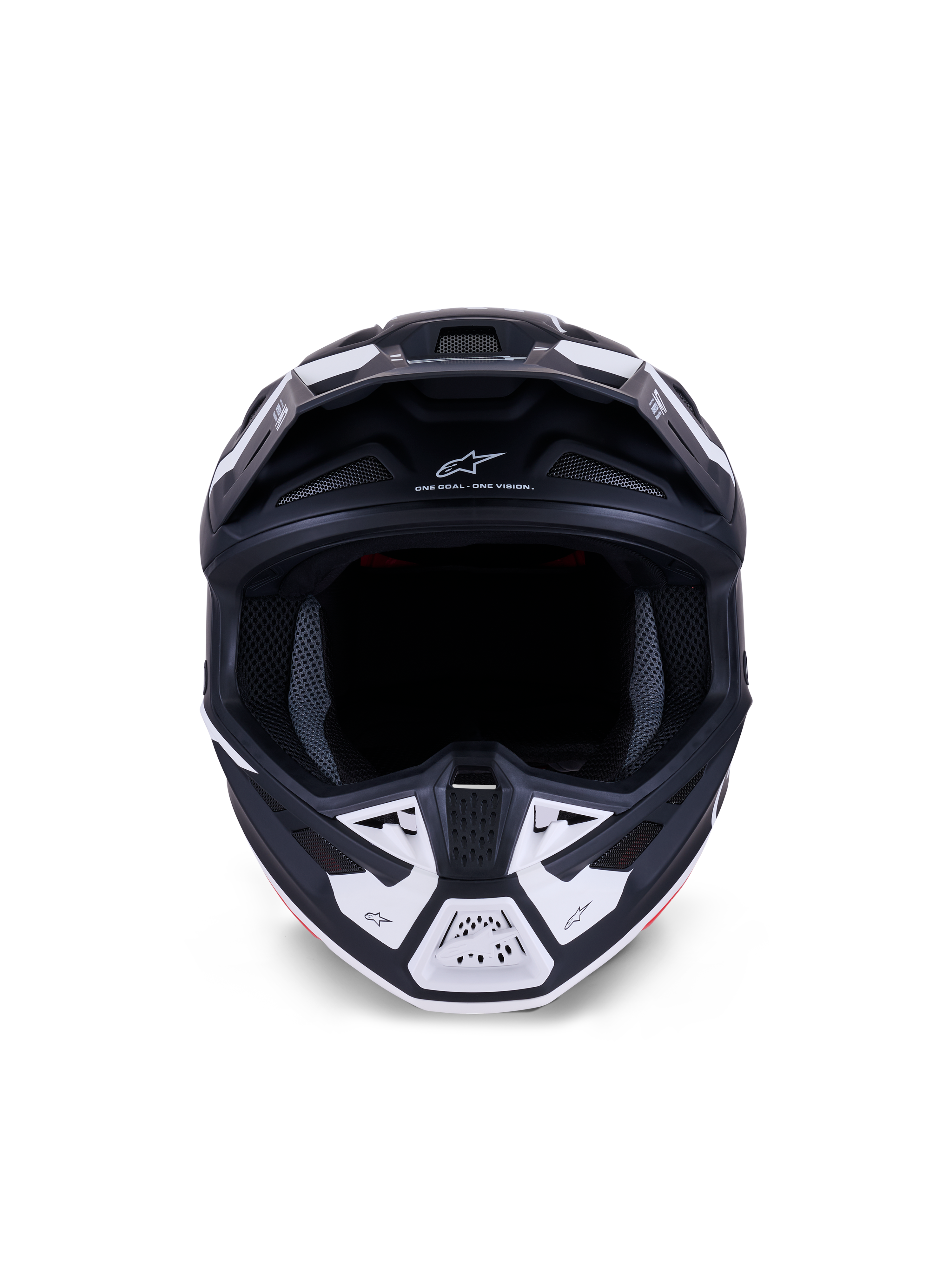 Alpinestars S-M7 Dasher Helmet ECE 22.06, casco de motocross, negro mate y blanco, vista frontal que muestra los puertos de ventilación y gráficos geométricos, incluye el texto "ONE GOAL - ONE VISION", protección profesional para carreras off-road