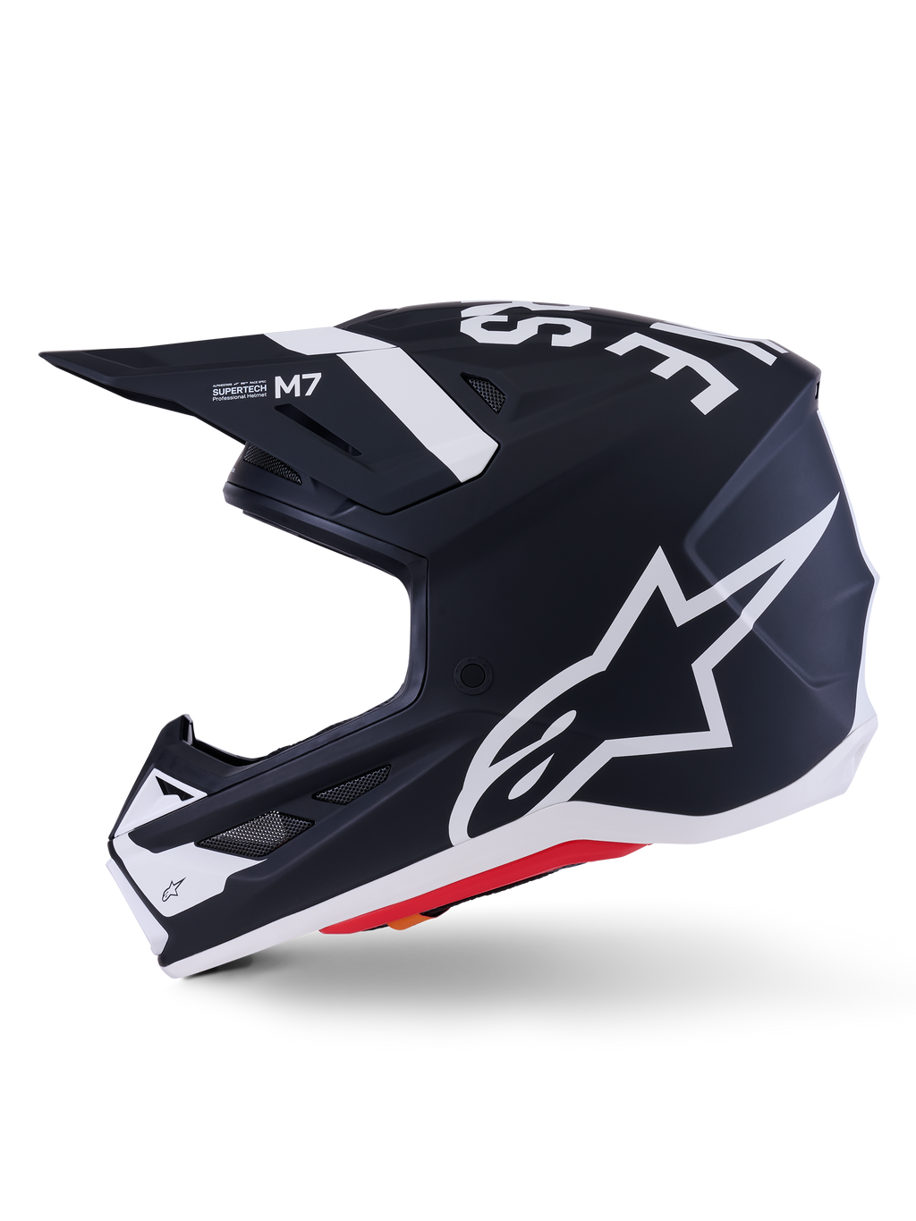 Casco Alpinestars S-M7 Dasher ECE 22.06, negro mate y blanco, perfil lateral con el logotipo grande de Alpinestars en blanco, calota de compuesto aerodinámico con puertos de ventilación y borde inferior rojo, protección profesional para motocross