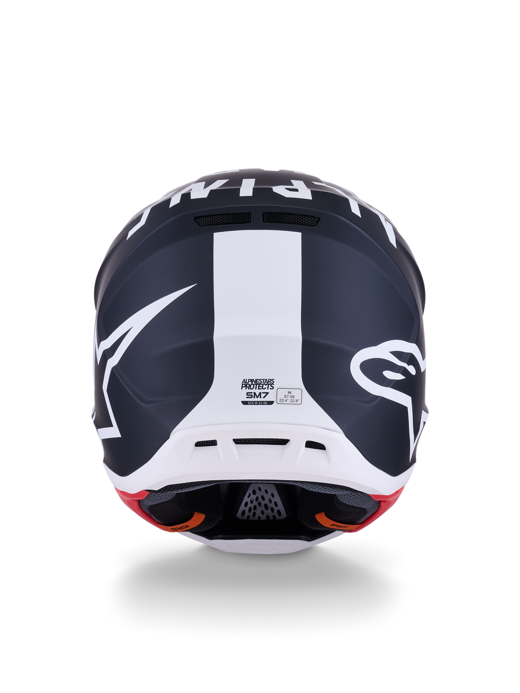 Casco Alpinestars S-M7 Dasher, casco de motocross, negro mate y blanco con detalles en rojo, vista posterior con el llamativo logotipo de la estrella y una franja blanca central, diseño aerodinámico para carreras todoterreno