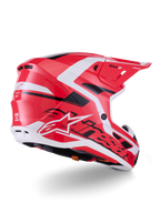 Casco Alpinestars S-M7 Deed, casco de motocross, rojo, negro y blanco brillante, con carcasa aerodinámica, puertos de ventilación y logotipos distintivos de Alpinestars, vista trasera de tres cuartos