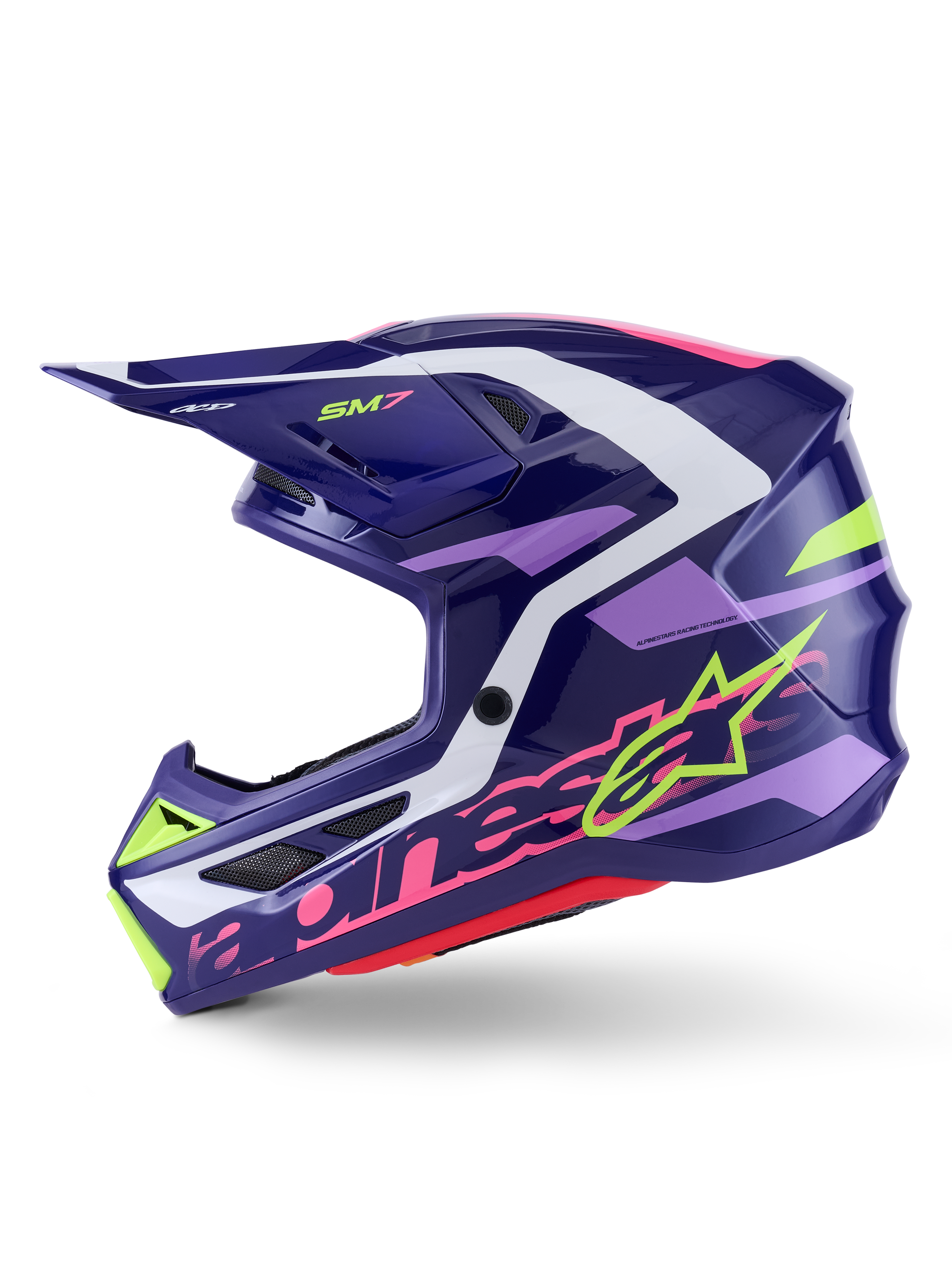 Casco de motocross Alpinestars S-M7 Deed, púrpura y rosa brillante, vista de perfil lateral, con logotipos de Alpinestars en verde lima y rosa, calota aerodinámica con detalles en blanco y púrpura claro, acabado brillante, diseñado para carreras off-road