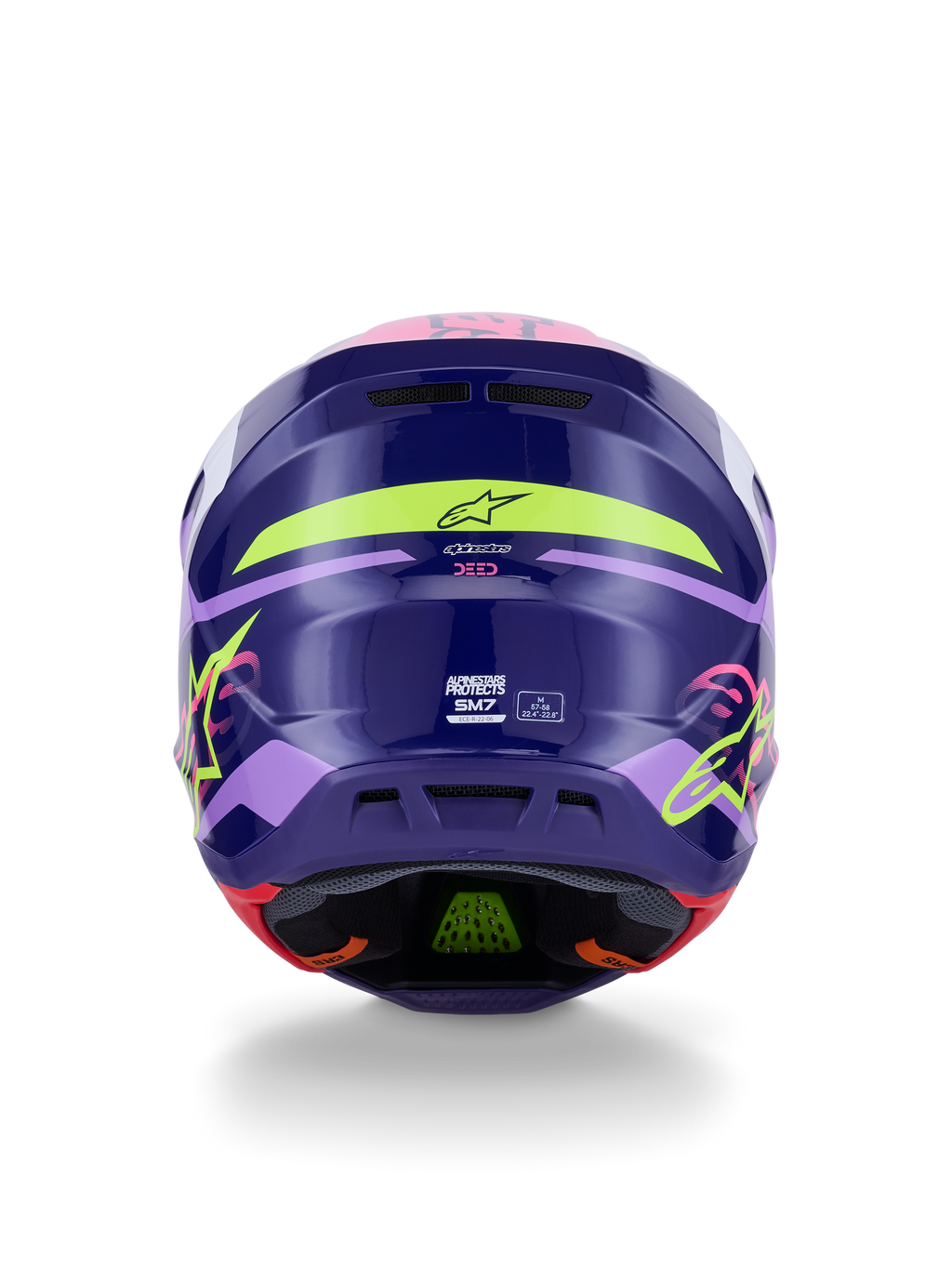 Casco Alpinestars S-M7 Deed ECE 22.06, casco de motocross, vista posterior en morado y rosa brillante, con gráficos en amarillo neón y rosa, calota de composite aerodinámica con logotipos SM7 y marcas de certificación, equipamiento de alto rendimiento para carreras off-road