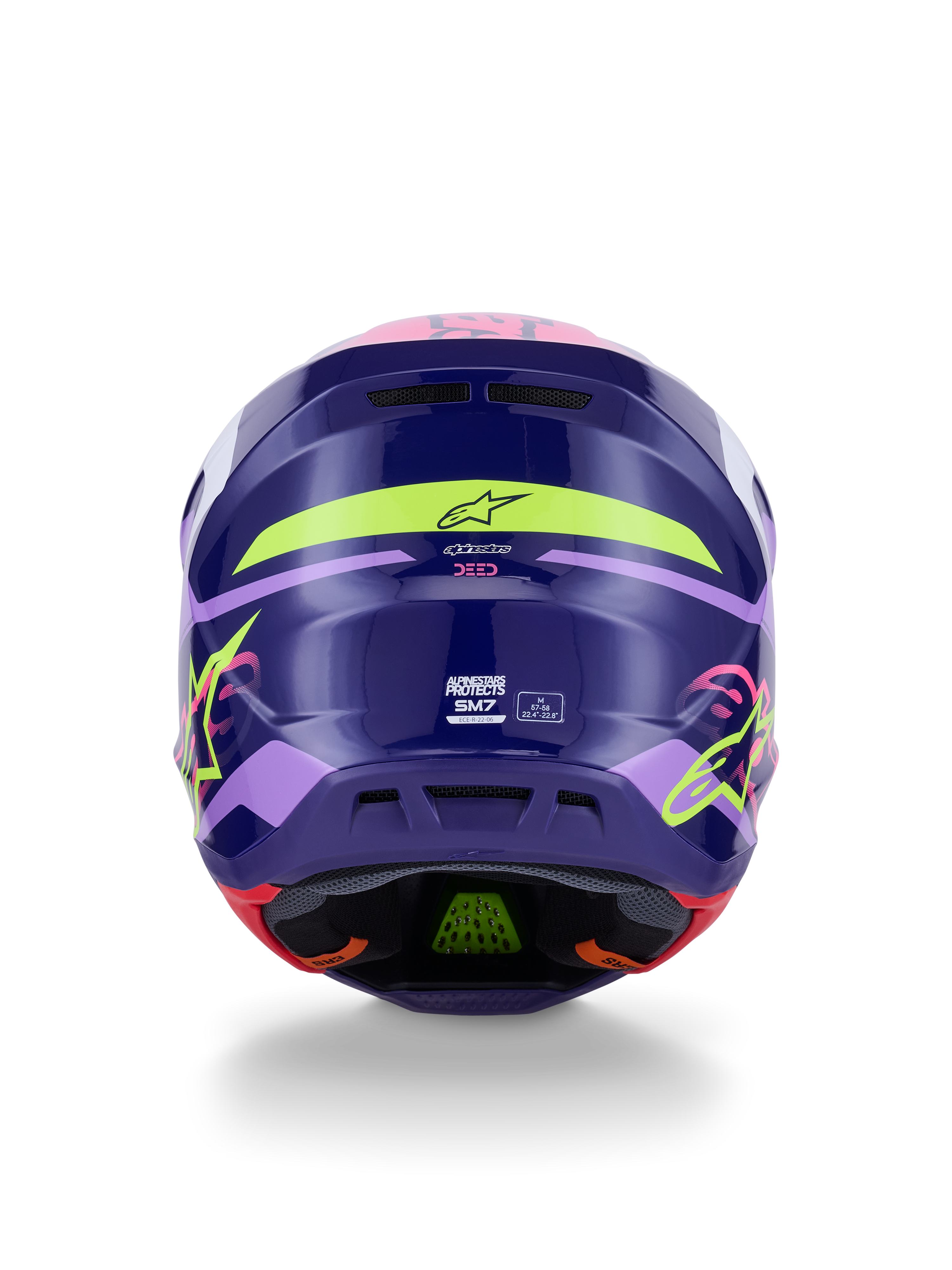 Casco Alpinestars S-M7 Deed ECE 22.06, casco de motocross, vista posterior en morado y rosa brillante, con gráficos en amarillo neón y rosa, calota de composite aerodinámica con logotipos SM7 y marcas de certificación, equipamiento de alto rendimiento para carreras off-road