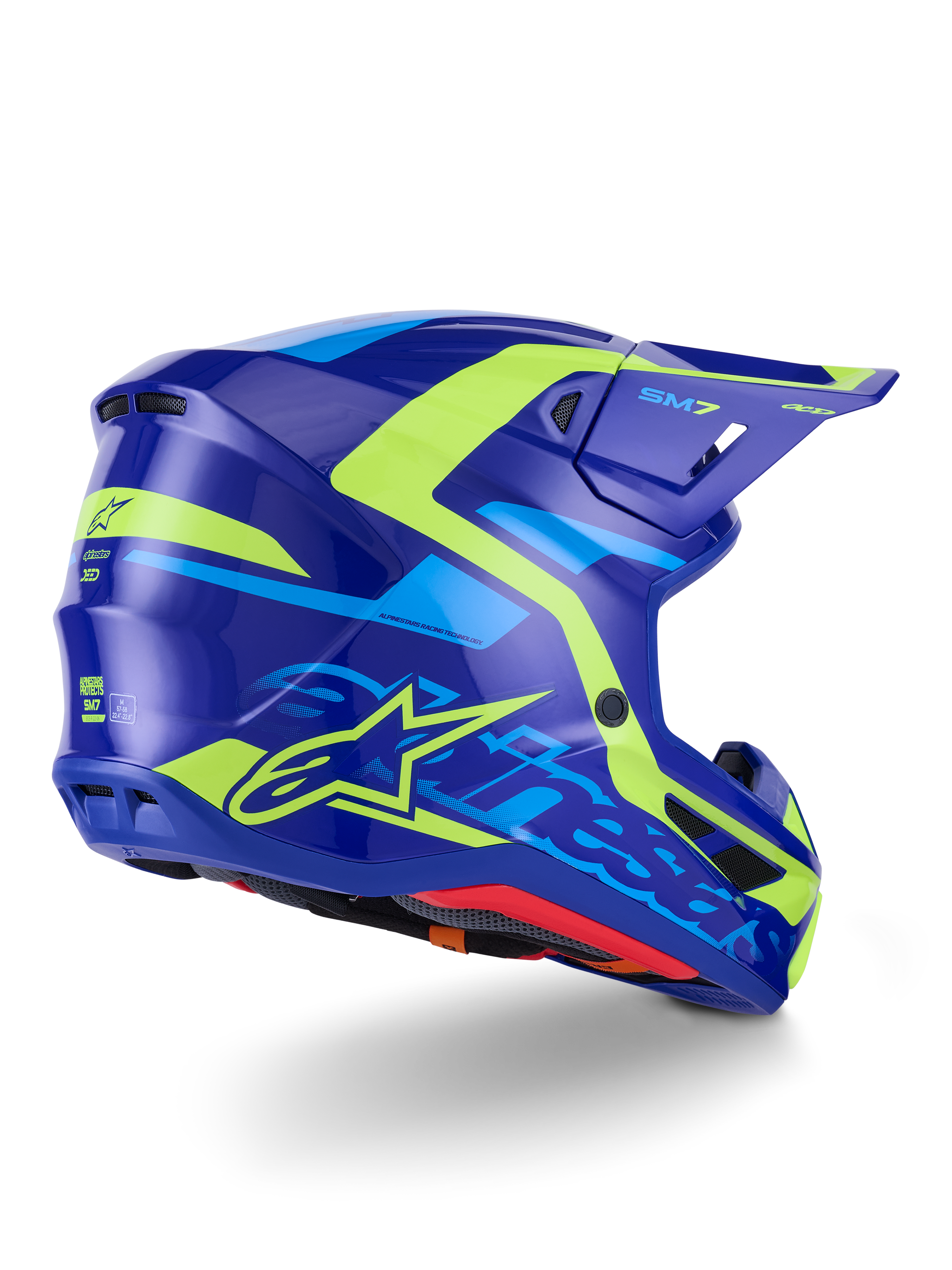 Casco Alpinestars S-M7 Deed ECE 22.06, casco de motocross, azul y amarillo flúor brillante, vista lateral-trasera con un perfil de carcasa aerodinámico y elegante, logotipos distintivos de Alpinestars con detalles en amarillo neón brillante, puertos de ventilación de alto rendimiento y acabado brillante para carreras todoterreno