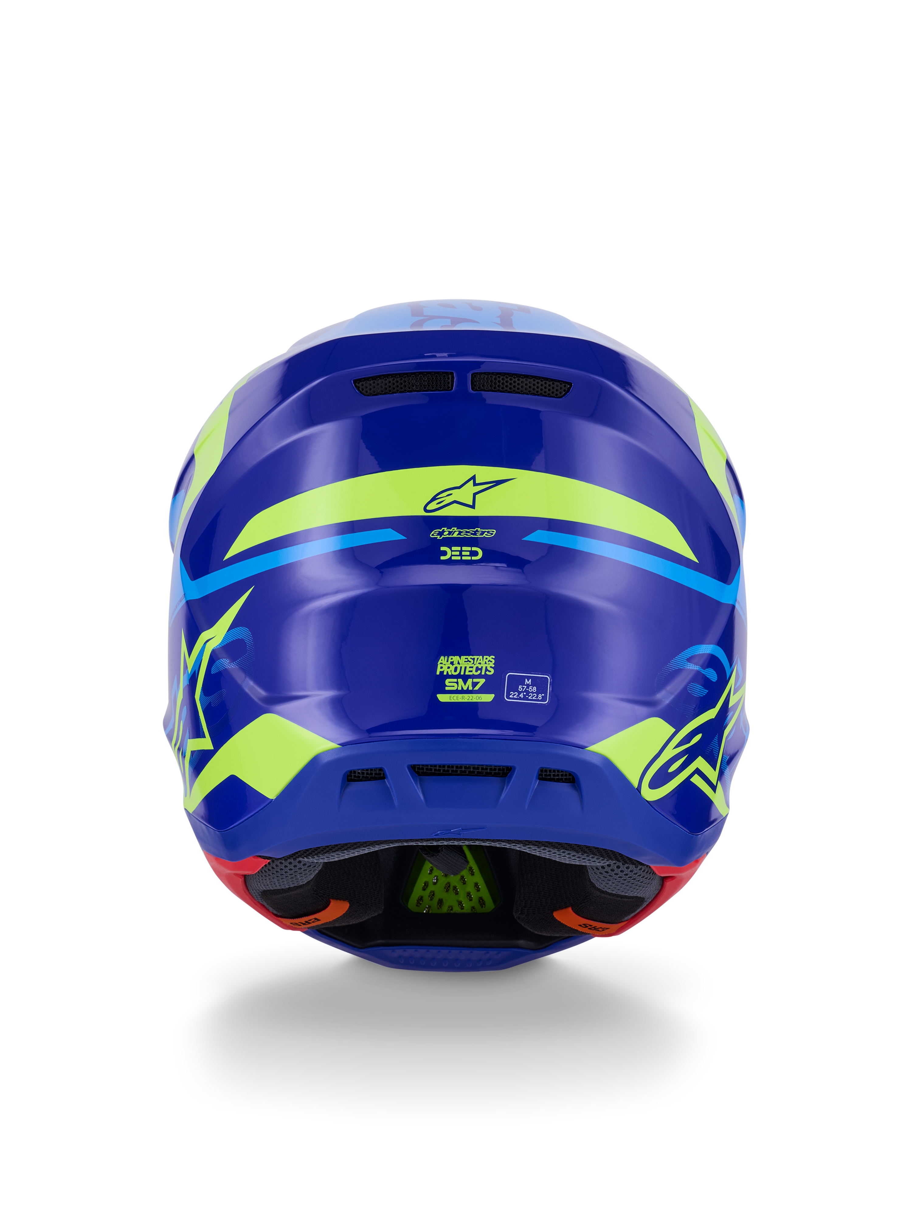 Casco Alpinestars S-M7 Deed ECE 22.06, casco de motocross, vista trasera, azul y amarillo flúor brillante, con gráficos llamativos en amarillo flúor y logotipos de estrellas, puertos de escape traseros y acolchado interno visible con tecnología PLASMA verde.
