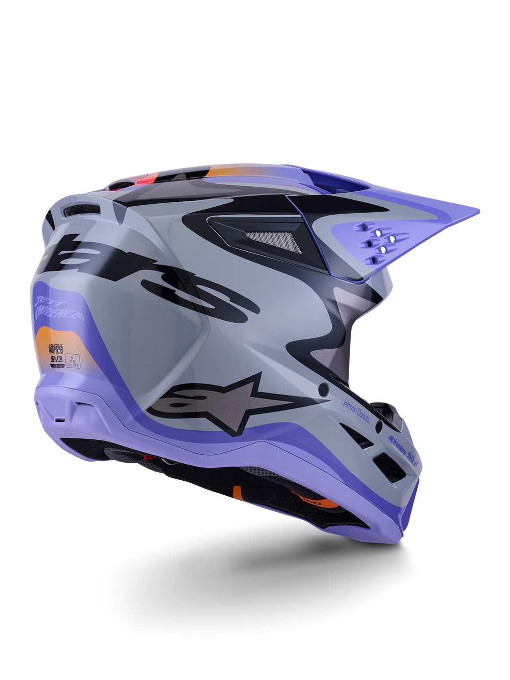Alpinestars S-M3 Jettson Helmet ECE 22.06, casco de motocross, gris, morado y negro brillante, vista trasera de tres cuartos que muestra la carcasa aerodinámica termoinyectada con puertos de ventilación y un diseño gráfico audaz