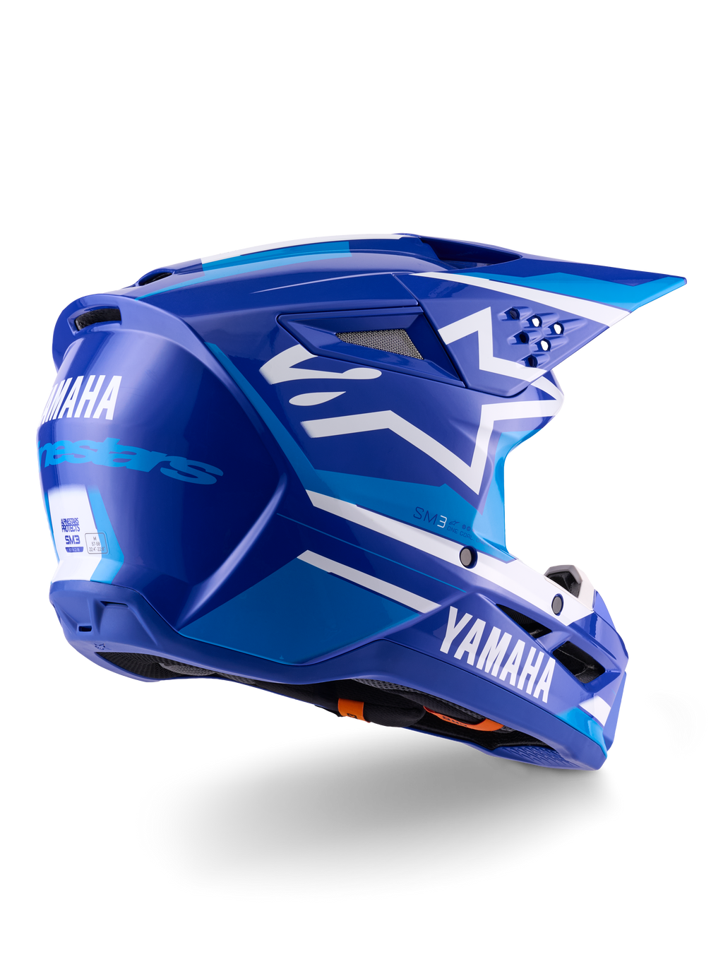 Casco Alpinestars Yamaha S-M3 ECE 22.06, casco de motocross, azul y blanco brillante, con logotipos de Yamaha y Alpinestars, logo de estrella blanca en el lateral, múltiples rejillas de ventilación de entrada y salida, diseño aerodinámico para rendimiento off-road