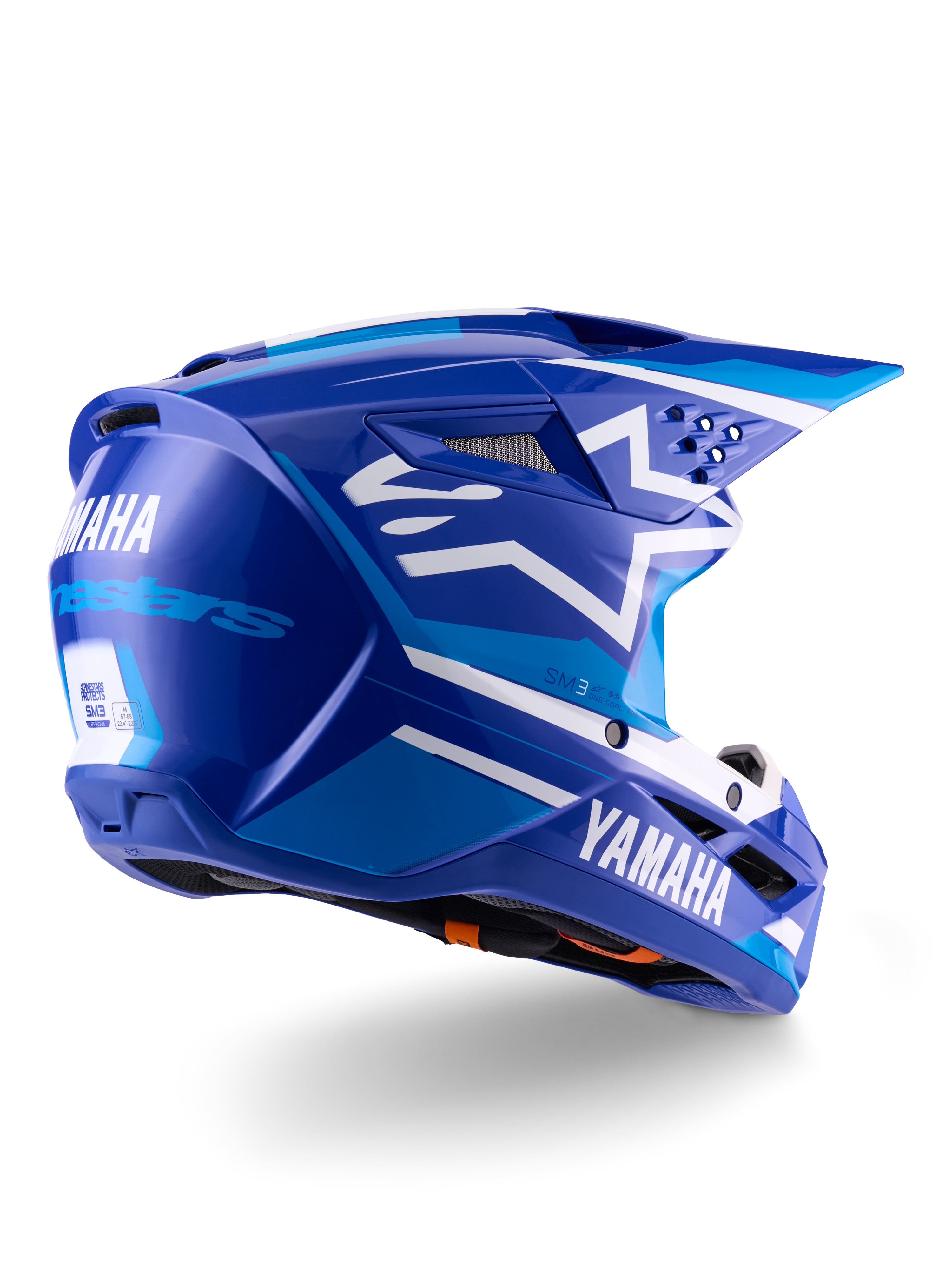 Casco Alpinestars Yamaha S-M3 ECE 22.06, casco de motocross, azul y blanco brillante, con logotipos de Yamaha y Alpinestars, logo de estrella blanca en el lateral, múltiples rejillas de ventilación de entrada y salida, diseño aerodinámico para rendimiento off-road