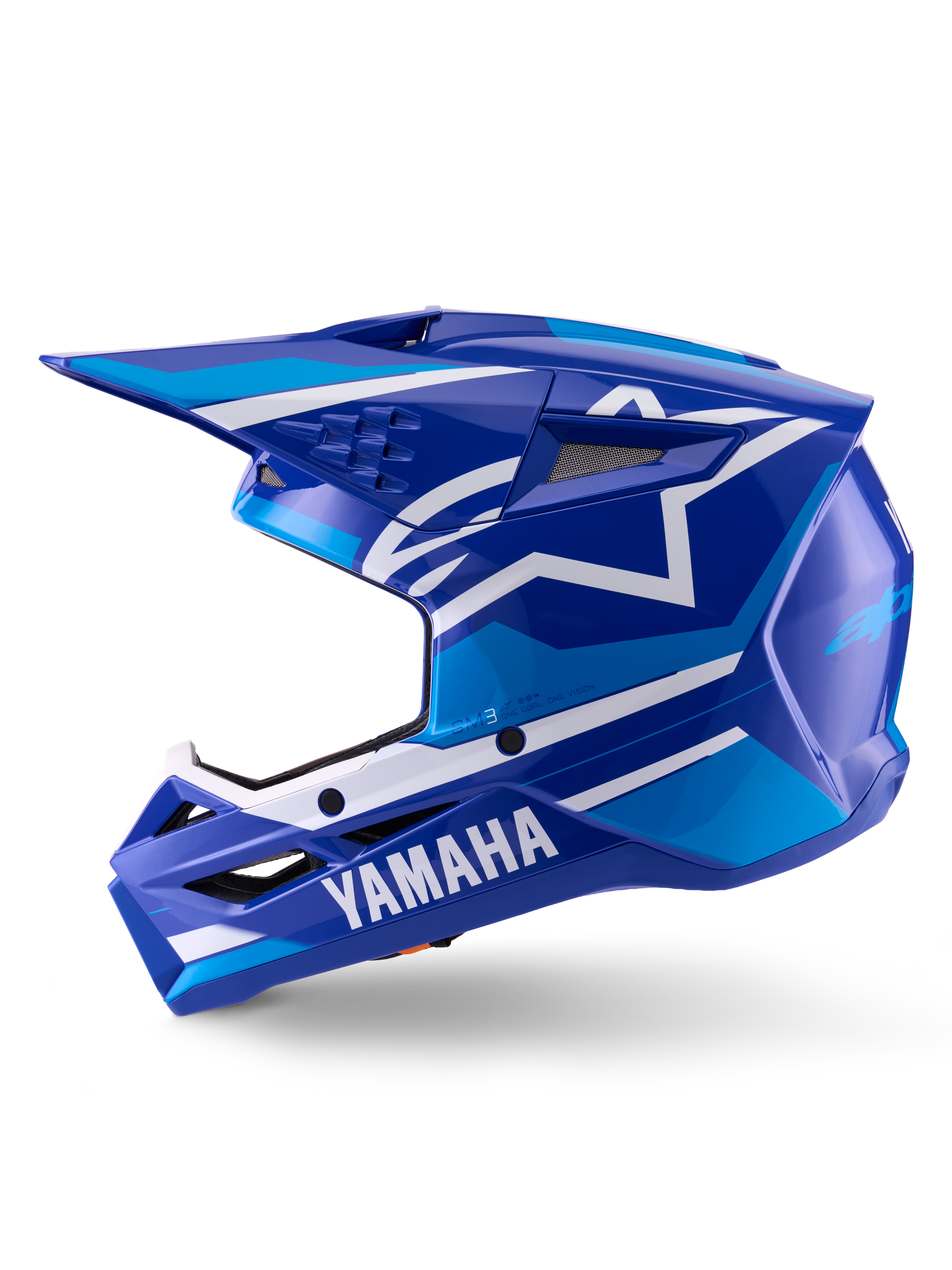Casco Alpinestars Yamaha S-M3, casco de motocross, azul y blanco brillante, vista de perfil lateral con la marca Yamaha en la mentonera y el logo de la estrella de Alpinestars, calota aerodinámica con puertos de ventilación para carreras off-road