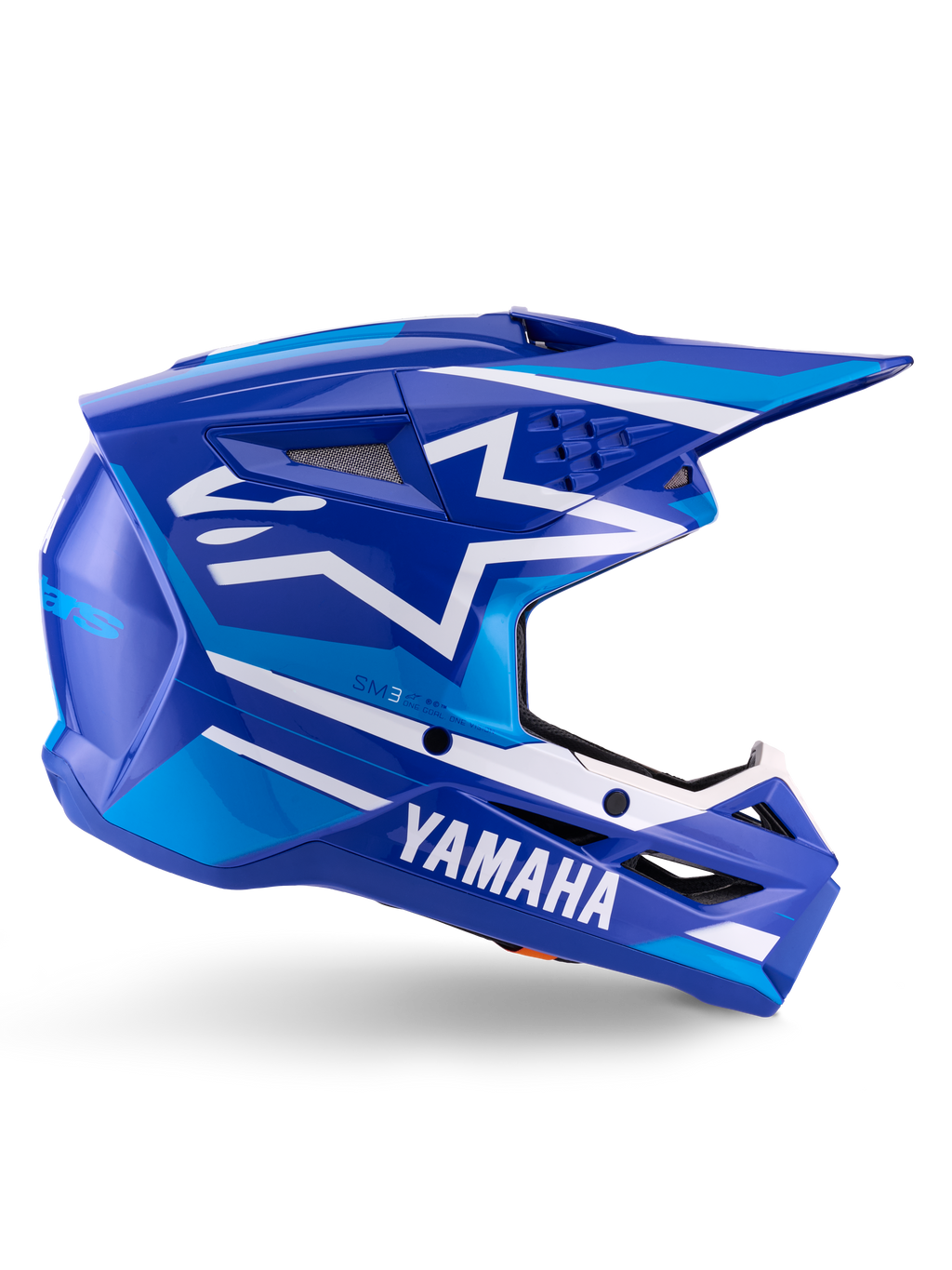 Alpinestars Yamaha S-M3 Helmet ECE 22.06, casco de motocross, azul y blanco brillante, con logotipos de Yamaha destacados y patrones geométricos, diseño aerodinámico con ventilaciones de malla negra y visera puntiaguda, equipo profesional de off-road