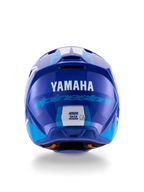 Casco Alpinestars Yamaha S-M3, casco de motocross, azul y blanco brillante, vista trasera que muestra el logotipo blanco de YAMAHA y la inscripción azul de Alpinestars, acabado brillante con puertos de ventilación y etiquetas de certificación de seguridad visibles.
