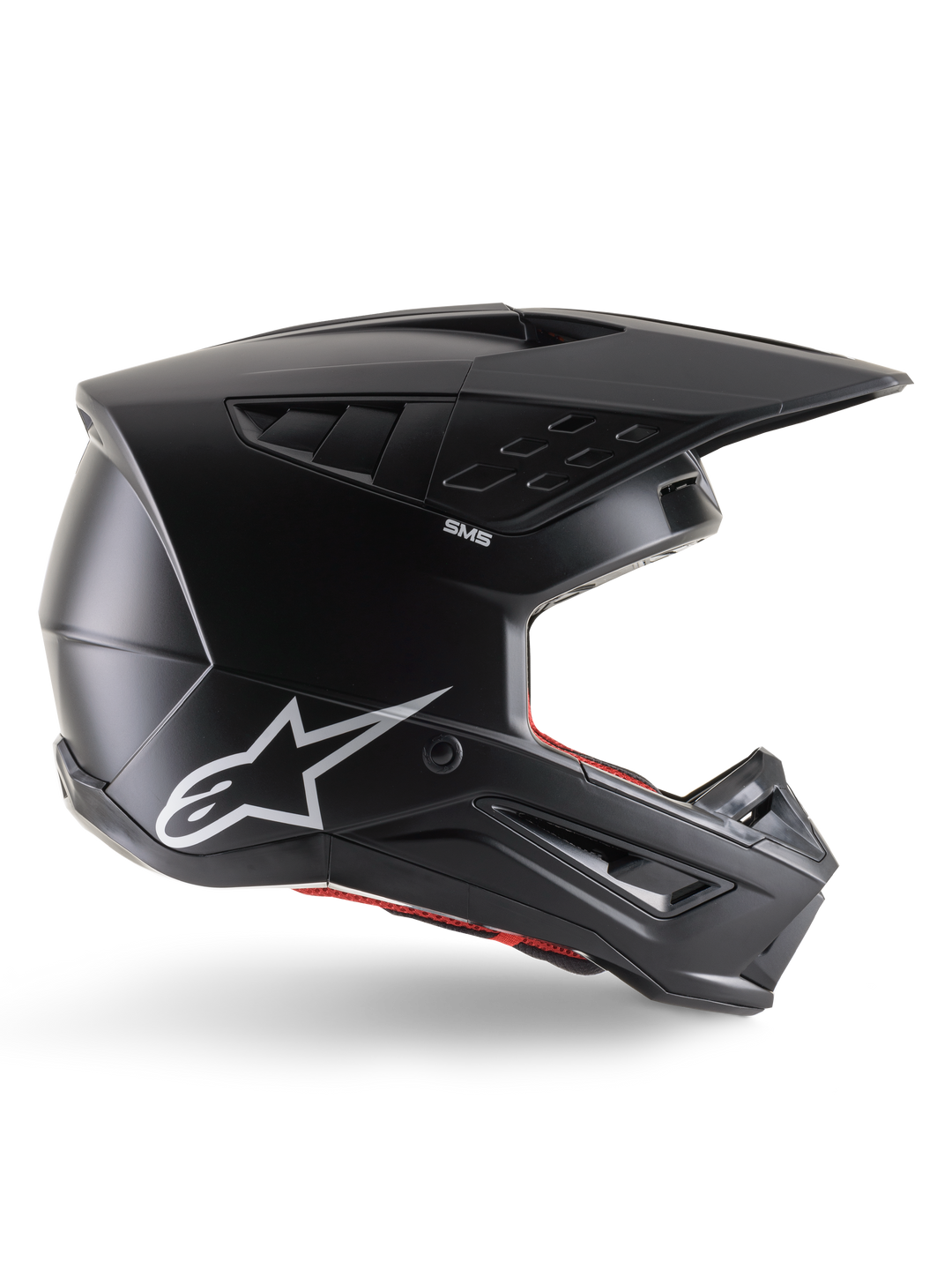 Casco Alpinestars S-M5 Solid, casco de motocross, negro mate, con el logotipo de la estrella de Alpinestars en blanco y forro interior rojo, diseño aerodinámico con múltiples entradas de aire y visera larga, protección todoterreno con certificación ECE 22.06