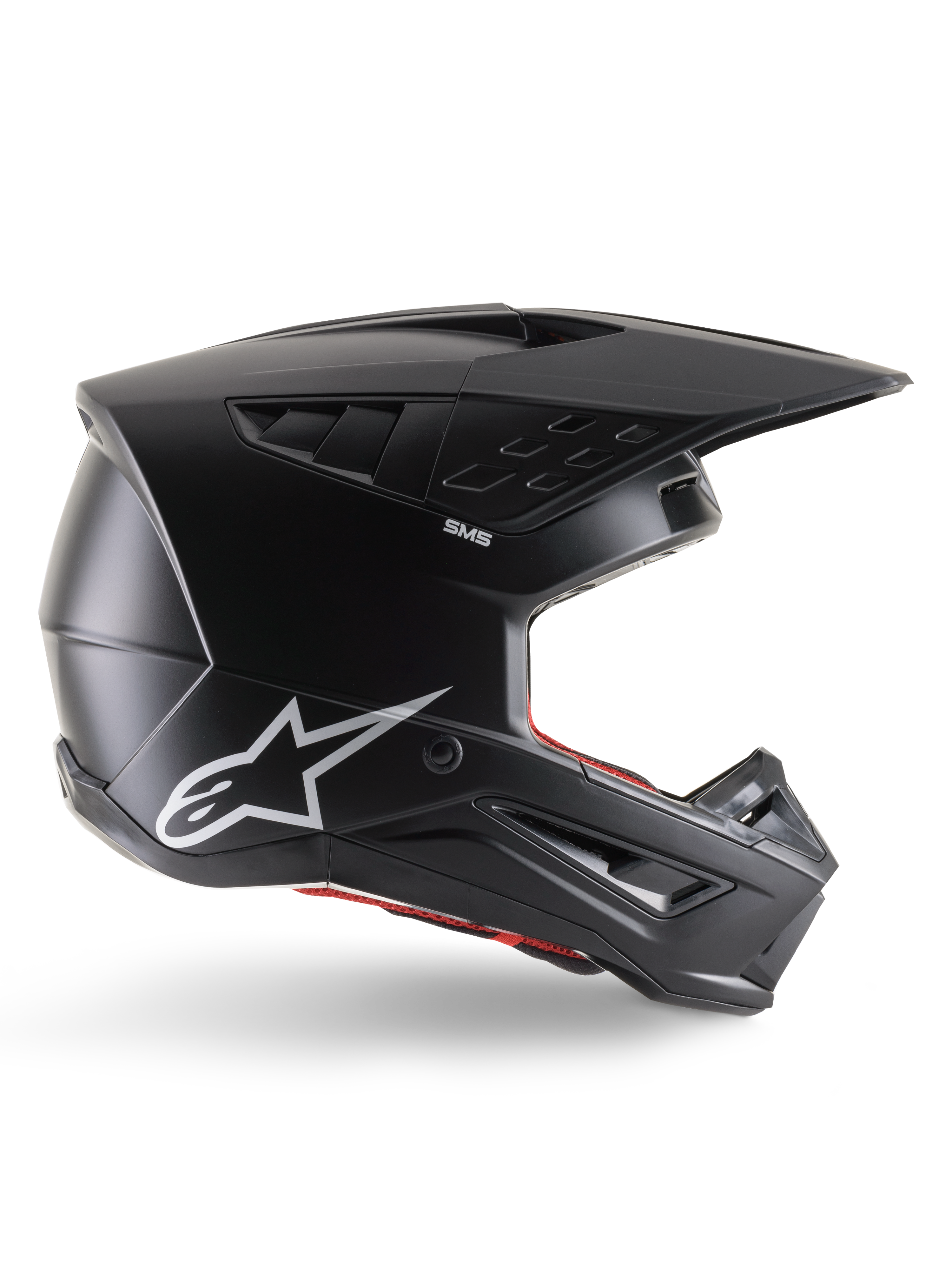 Casco Alpinestars S-M5 Solid, casco de motocross, negro mate, con el logotipo de la estrella de Alpinestars en blanco y forro interior rojo, diseño aerodinámico con múltiples entradas de aire y visera larga, protección todoterreno con certificación ECE 22.06