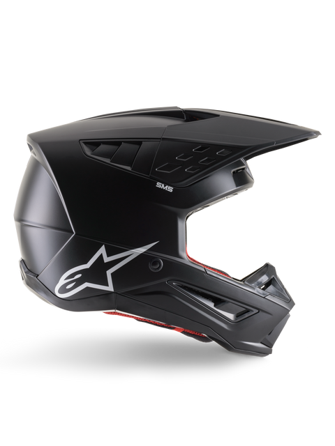 Alpinestars S-M5 Solid Helmet, Motocross Helmet, Matte Black, featuring white Alpinestars star logo and red interior lining, aerodynamic design with multiple air vents and long visor, ECE 22.06 certified off-road protection