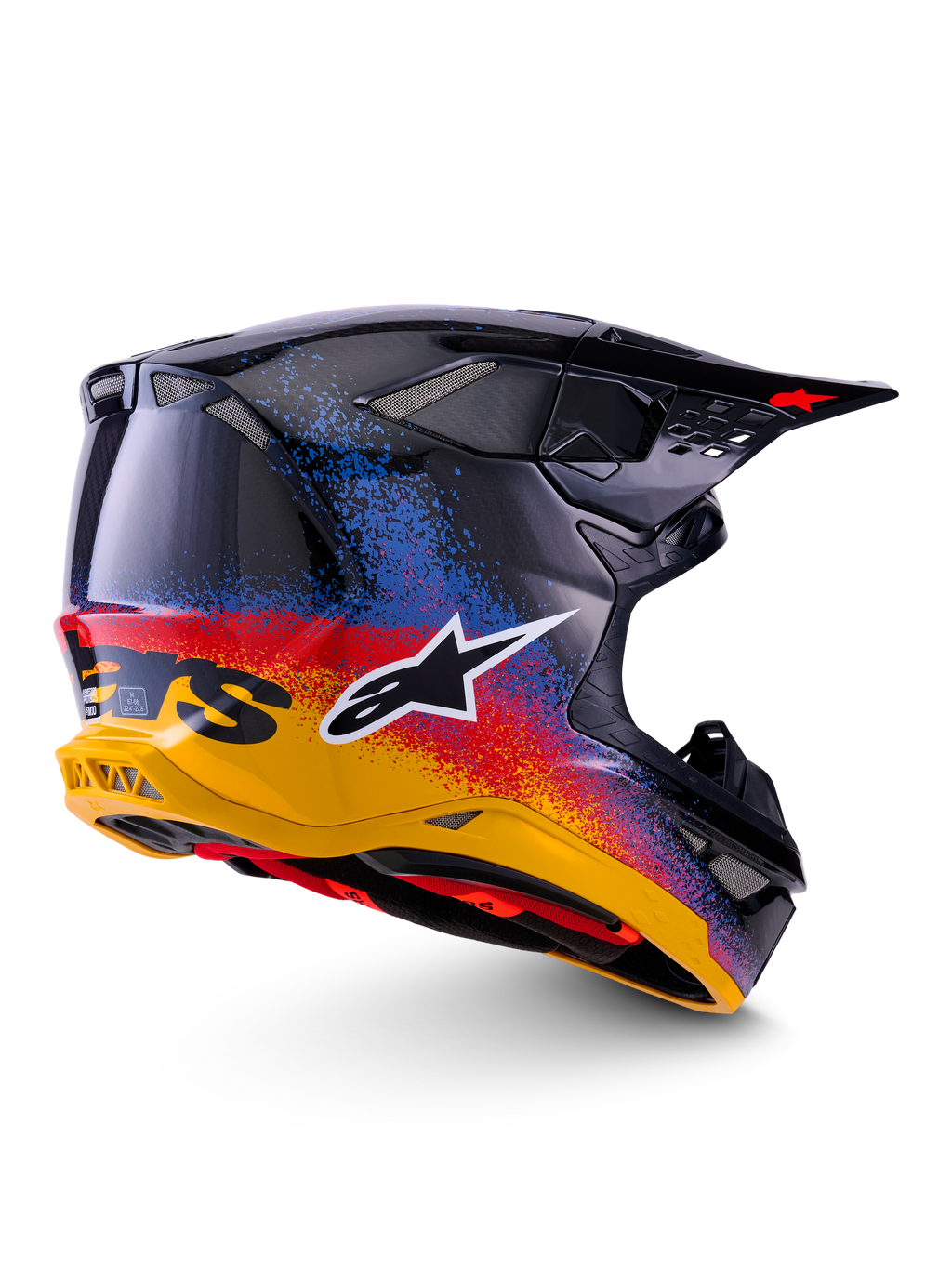 Casco Alpinestars Supertech M10 Black Hole Edición Limitada, casco de motocross, color negro brillante con un degradado moteado vibrante de amarillo a rojo y azul, calota ligera de fibra de carbono con logotipo A-star blanco y rejillas de ventilación de malla integradas