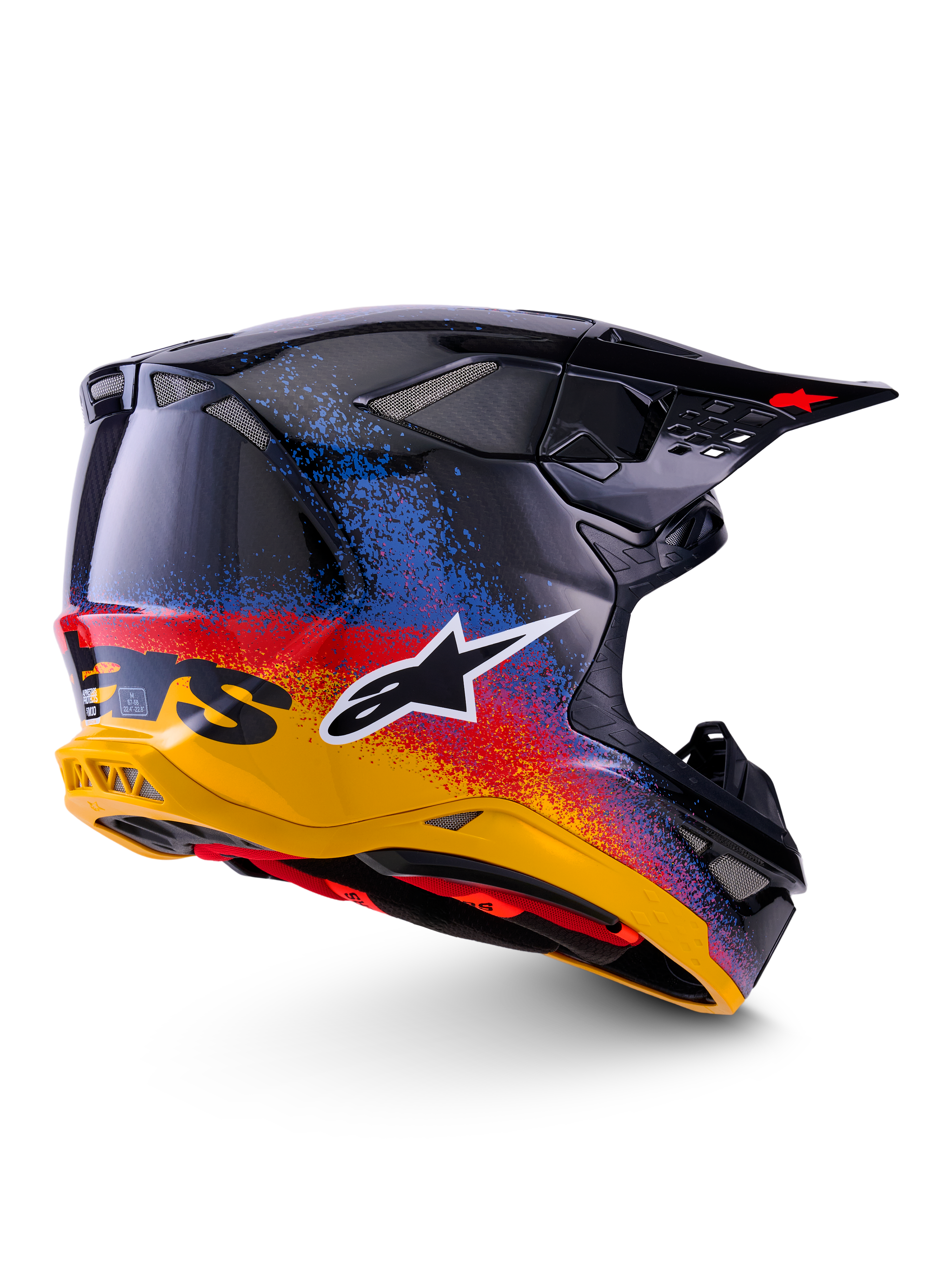 Casco Alpinestars Supertech M10 Black Hole Edición Limitada, casco de motocross, color negro brillante con un degradado moteado vibrante de amarillo a rojo y azul, calota ligera de fibra de carbono con logotipo A-star blanco y rejillas de ventilación de malla integradas