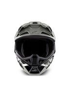 Casco Alpinestars Limited Edition S-M7 Wolf Dust, casco de motocross, color Dune Black Glossy con gráficos en blanco y negro, vista frontal que muestra la amplia apertura para las gafas y múltiples tomas de aire de ventilación, visera aerodinámica con el logotipo de Alpinestars y el texto 'One Goal One Vision', protección de cabeza especializada para carreras off-road