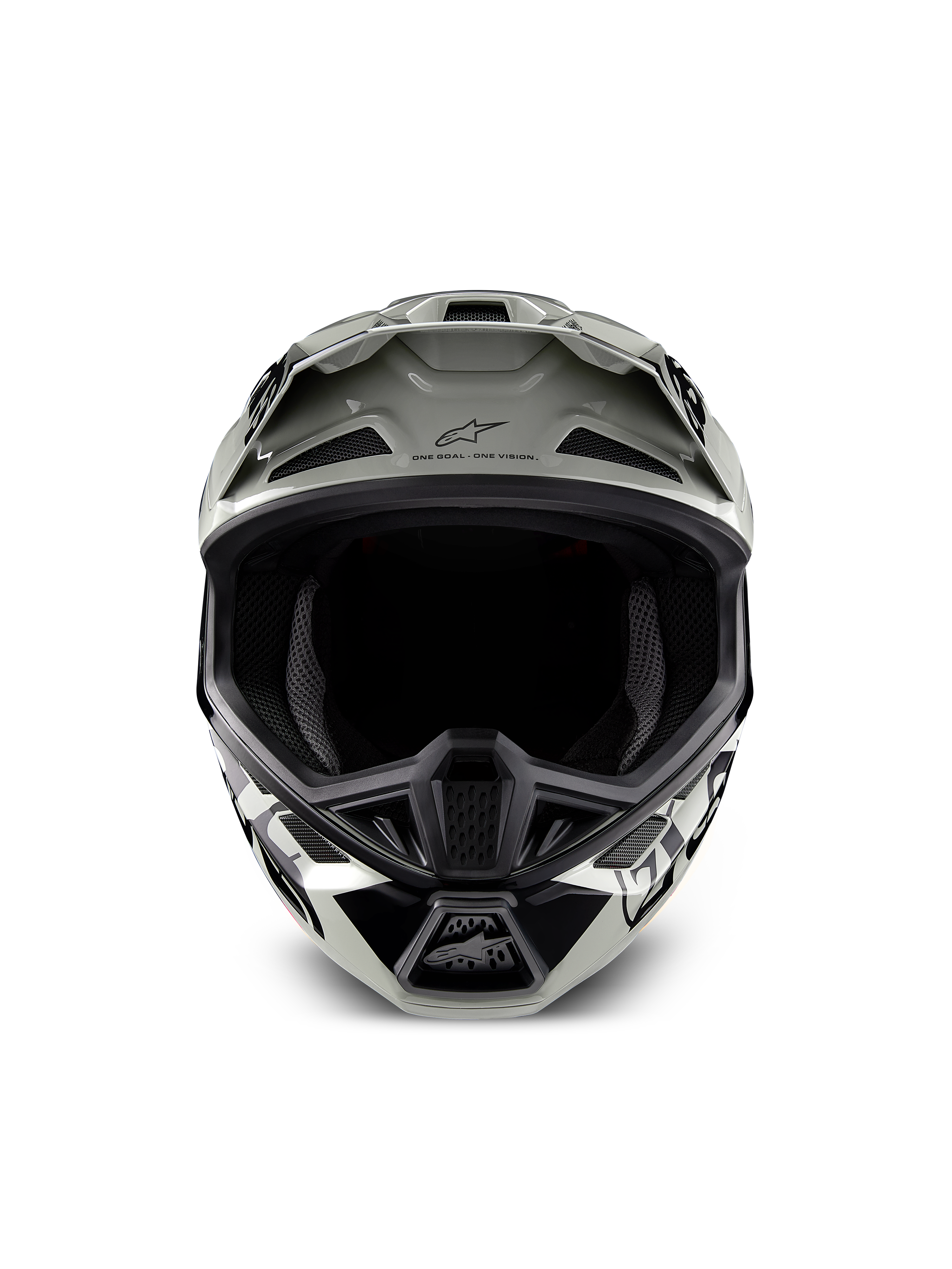 Casco Alpinestars Limited Edition S-M7 Wolf Dust, casco de motocross, color Dune Black Glossy con gráficos en blanco y negro, vista frontal que muestra la amplia apertura para las gafas y múltiples tomas de aire de ventilación, visera aerodinámica con el logotipo de Alpinestars y el texto 'One Goal One Vision', protección de cabeza especializada para carreras off-road