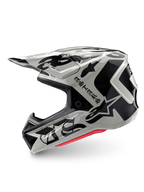 Casco Alpinestars Edición Limitada S-M7 Wolf Dust, casco de motocross, Dune Black Glossy, calota de color blanco roto con marca ASTARS en estilo gótico y patrones gráficos en negro, acolchado interior rojo visible, perfil aerodinámico para carreras off-road