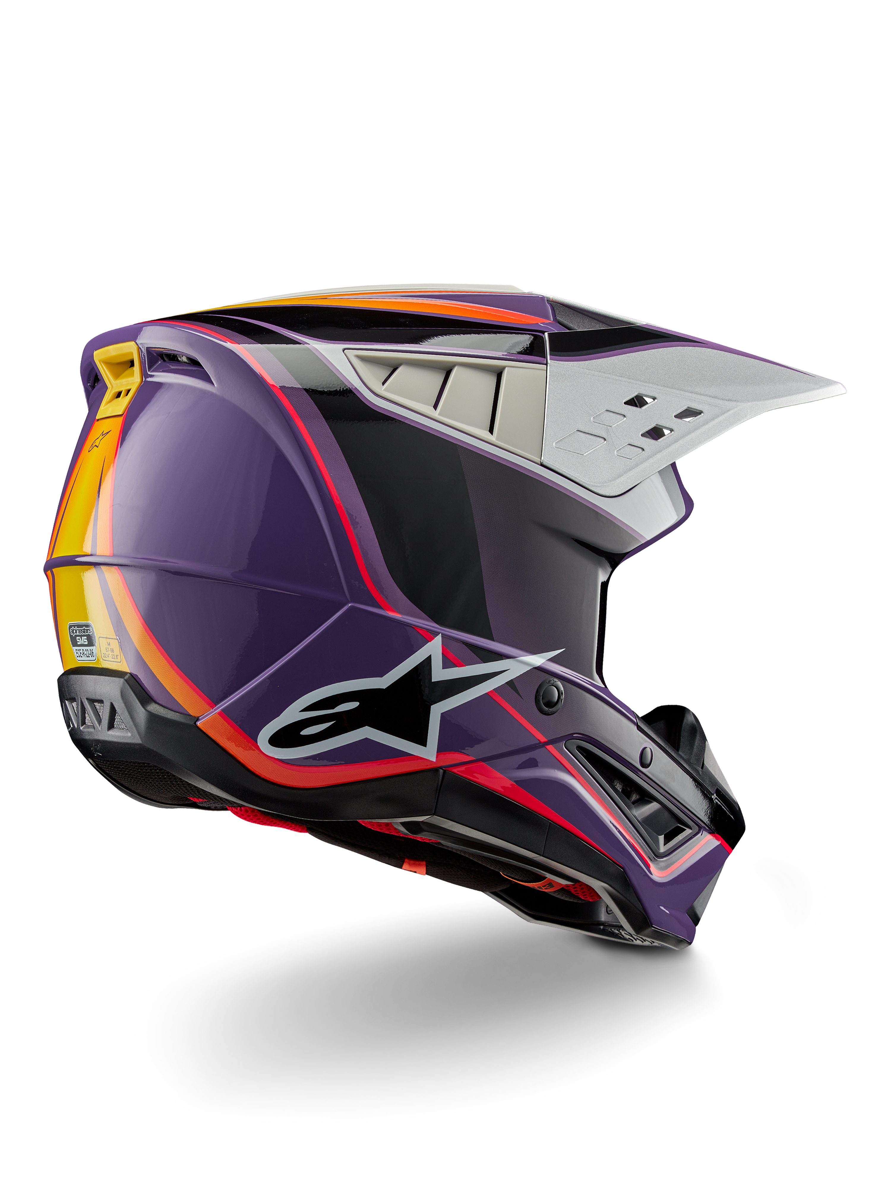 Alpinestars S-M5 Sail Helmet ECE, casco de motocross, violeta, negro y plata brillante, con detalles de rayas naranjas y amarillas, logotipo de estrella negra grande, perfil aerodinámico con puertos de ventilación traseros, acabado brillante para carreras todoterreno