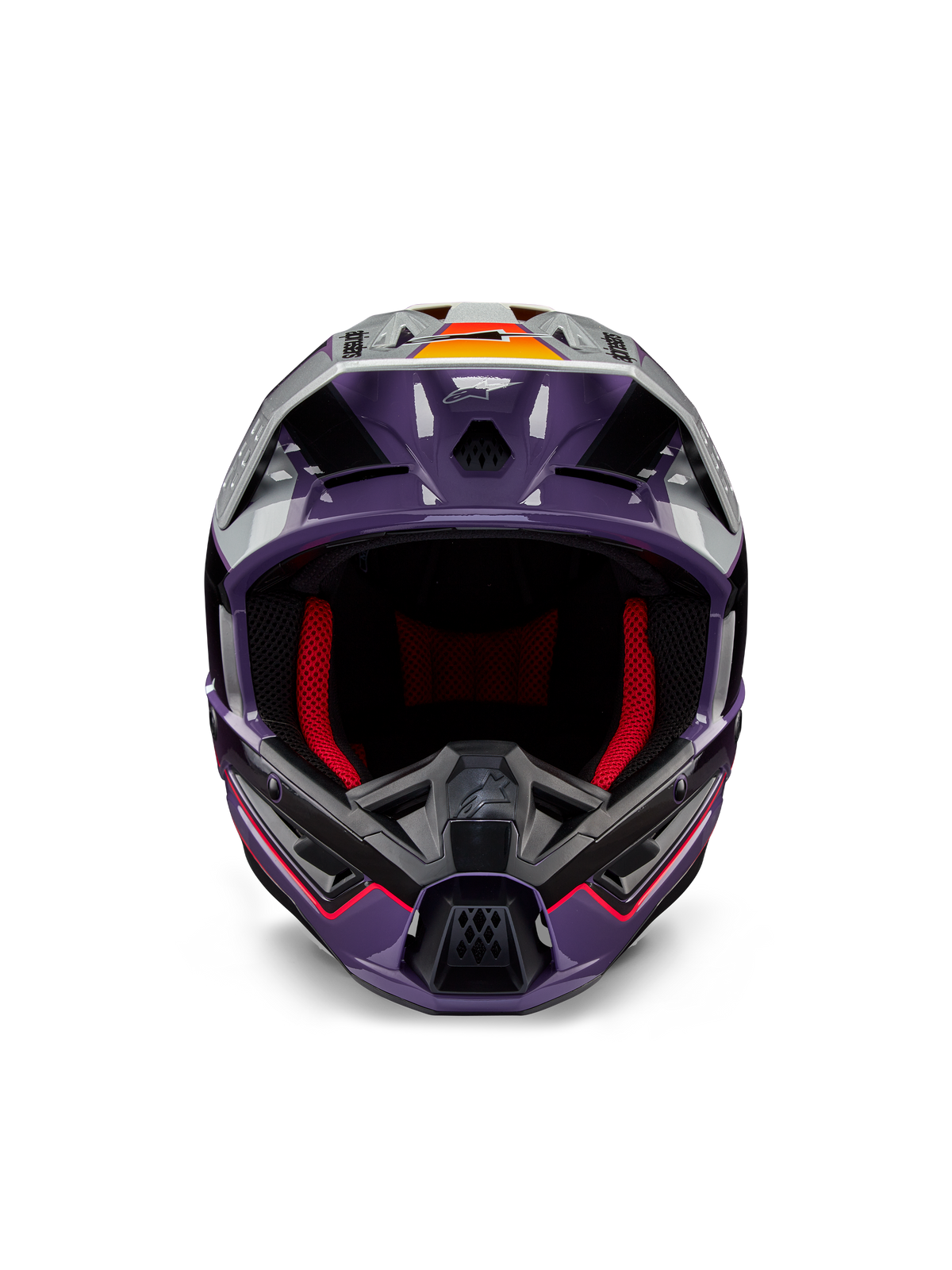 Alpinestars S-M5 Sail Helmet ECE, casco de motocross, violeta, negro y plateado brillante, vista frontal con acolchado interior rojo, mentonera ventilada y visera con detalles en naranja, calota aerodinámica elegante para protección todoterreno