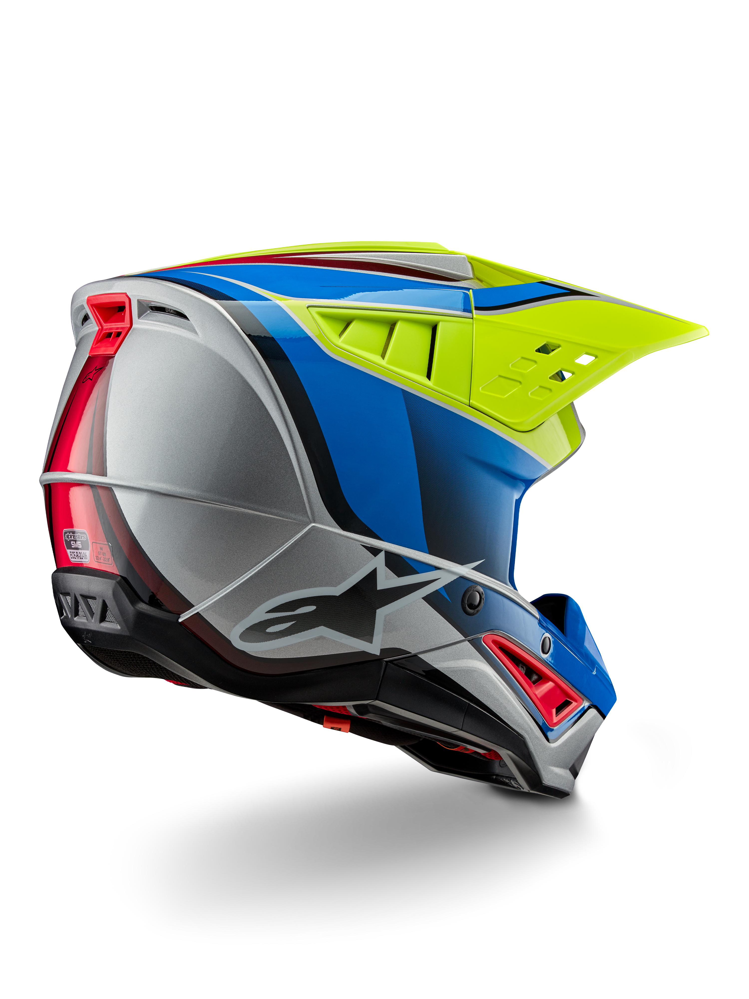 Alpinestars S-M5 Sail Helmet ECE, casco de motocross, amarillo flúor, azul esmalte y plata brillante, vista trasera de tres cuartos que muestra la calota termoplástica aerodinámica, visera grande ventilada y conductos de refrigeración integrados para protección en carreras todoterreno