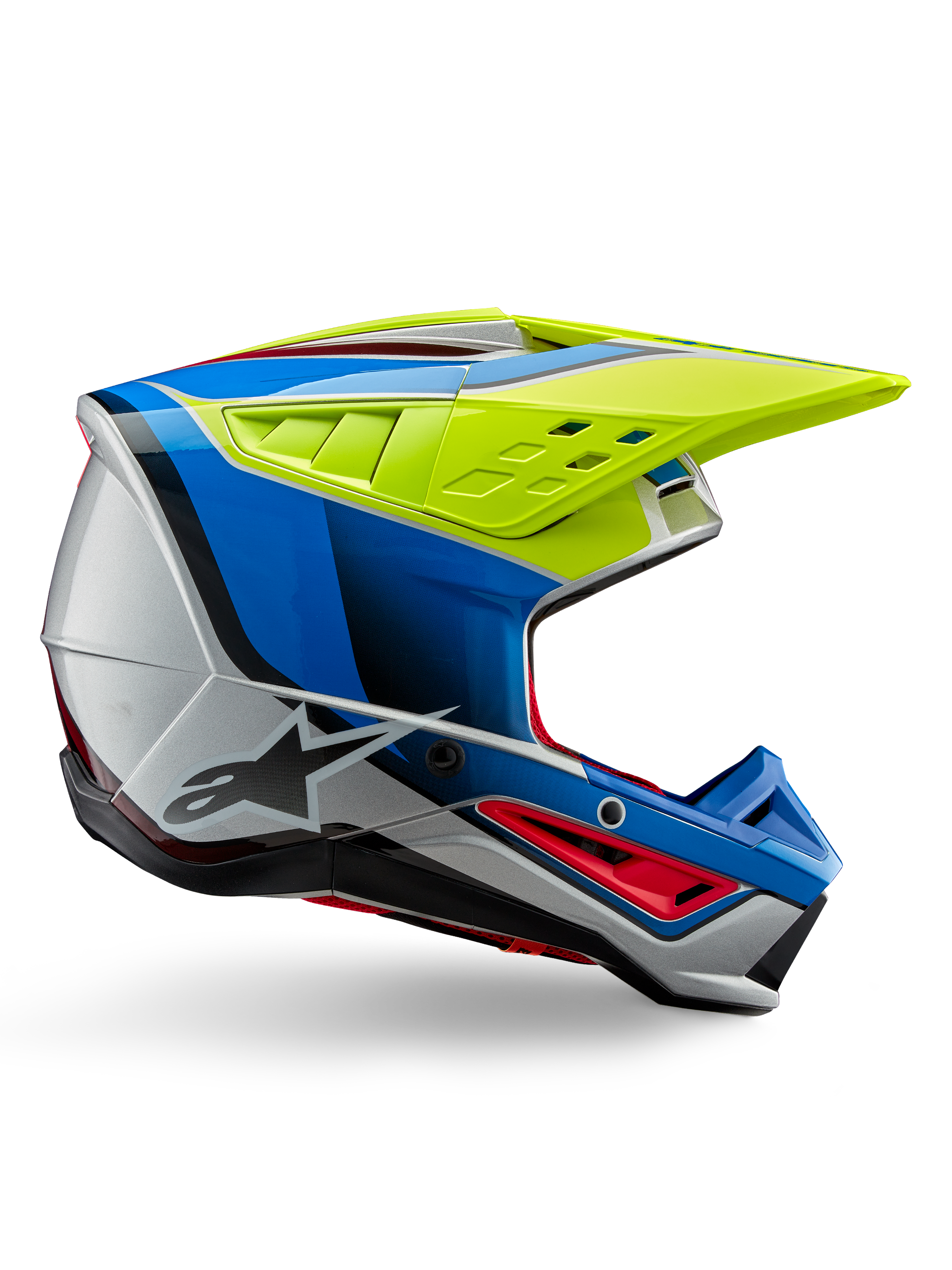 Alpinestars S-M5 Sail Helmet ECE, casco de motocross, amarillo flúor, azul esmalte y plateado brillante, perfil lateral con detalles en rojo y logotipo de la estrella en negro, diseño angular con puertos de ventilación, protección profesional para carreras off-road