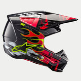 Alpinestars S-M5 Rash Helmet ECE, Motocross Helmet, Dark Gray and Bright Red Glossy, featuring vibrant yellow flame graphics, Alpinestars star logo, checkered patterns on the crown, and white brushstroke accents, high-performance off-road head protection