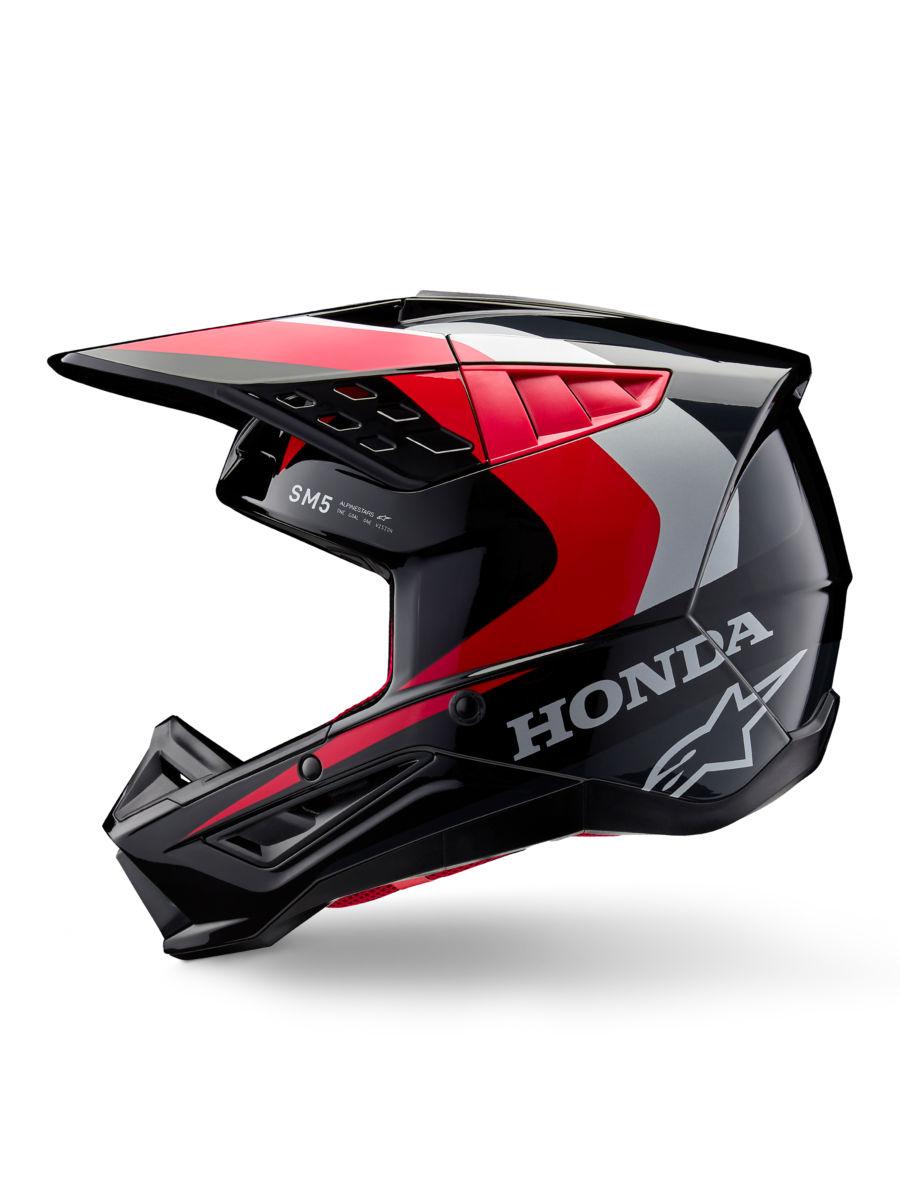 Casco Alpinestars Honda S-M5, casco de motocross, negro, rojo y plateado brillante, vista de perfil lateral con marca Honda y logotipo de estrella de Alpinestars, diseño aerodinámico con visera integrada y puertos de ventilación para rendimiento off-road