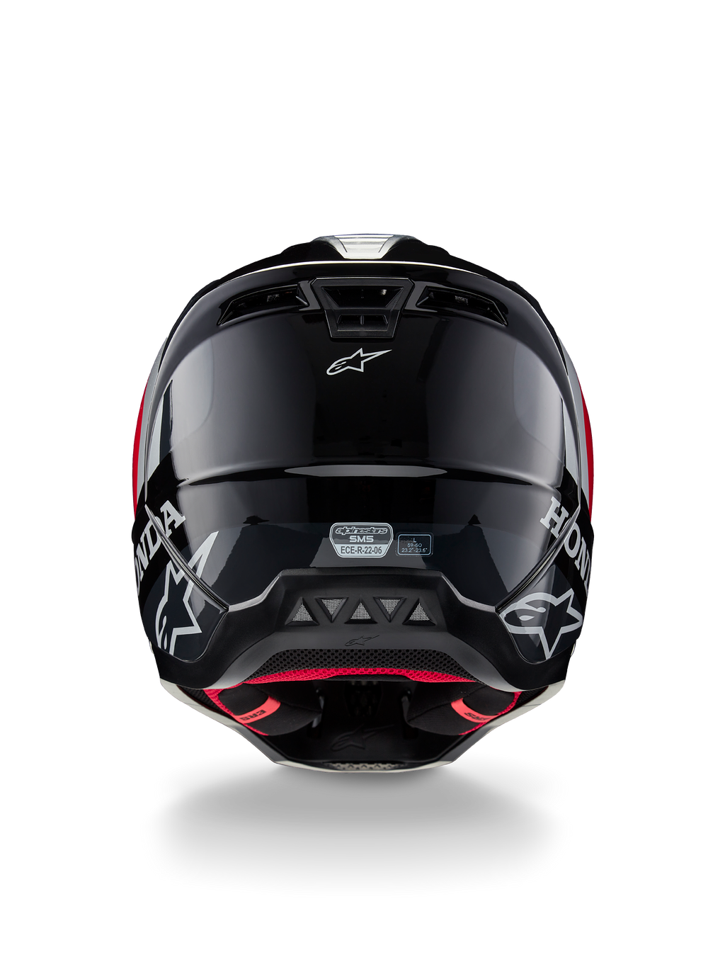 Alpinestars Honda S-M5 Helmet ECE, casco de motocross, negro y rojo brillante, vista trasera que muestra la calota negra brillante con logotipos blancos de Honda y Alpinestars, forro interior rojo y etiqueta de certificación de seguridad ECE